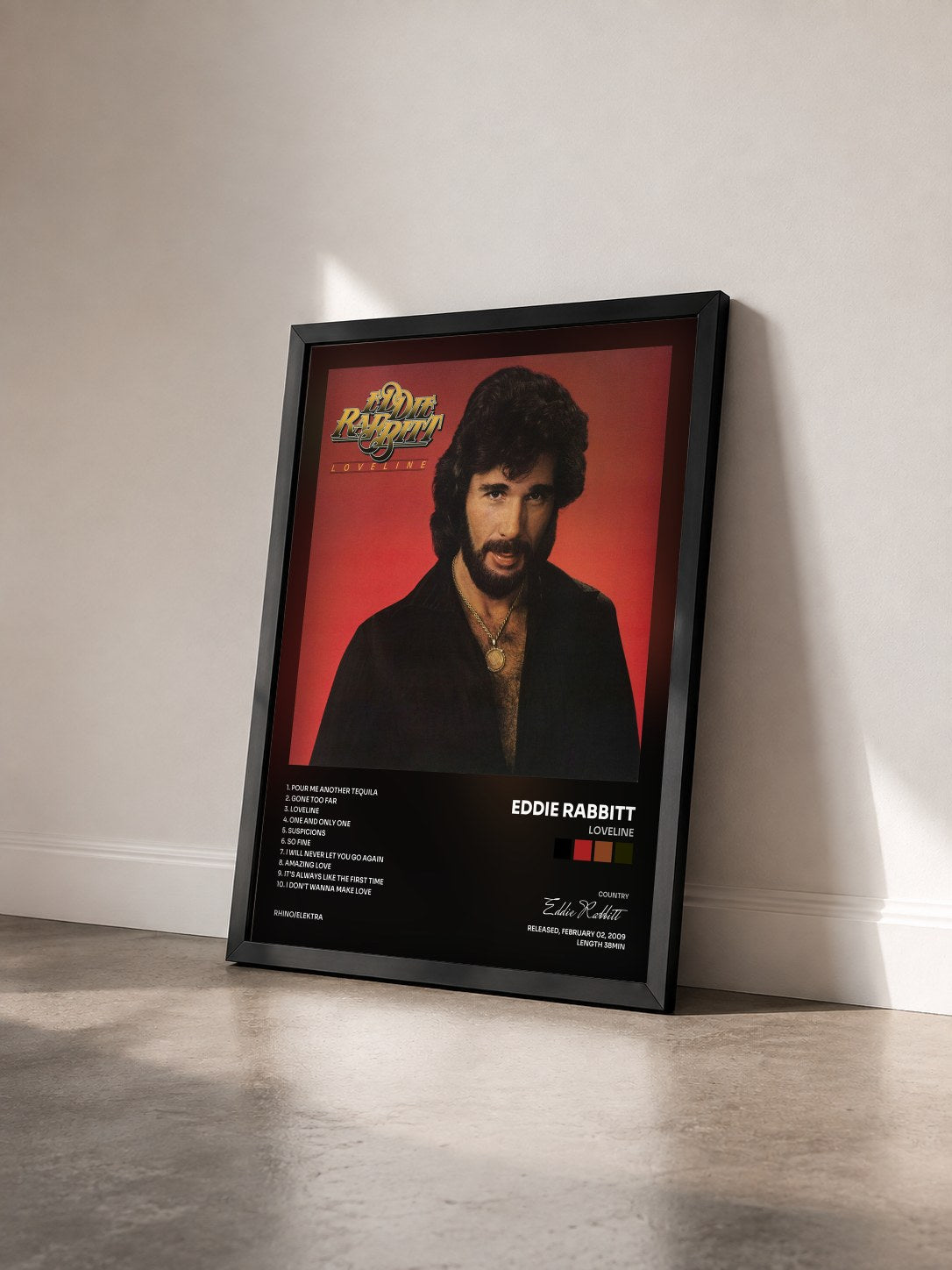 #noir Tableau de l'album Loveline de Eddie Rabbitt vu de trois quarts, cadre noir
