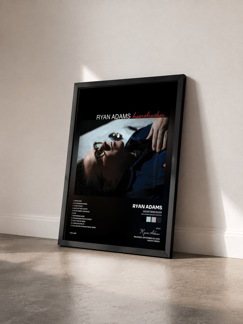 #noir Tableau de l'album Heartbreaker (25th Anniversary Edition) de Ryan Adams vu de trois quarts, cadre noir