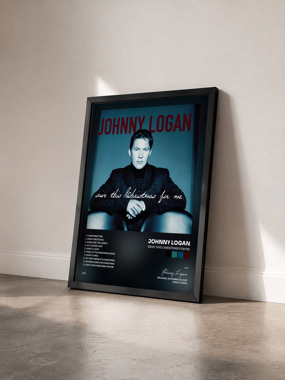 #noir Tableau de l'album Save This Christmas For Me de Johnny Logan vu de trois quarts, cadre noir