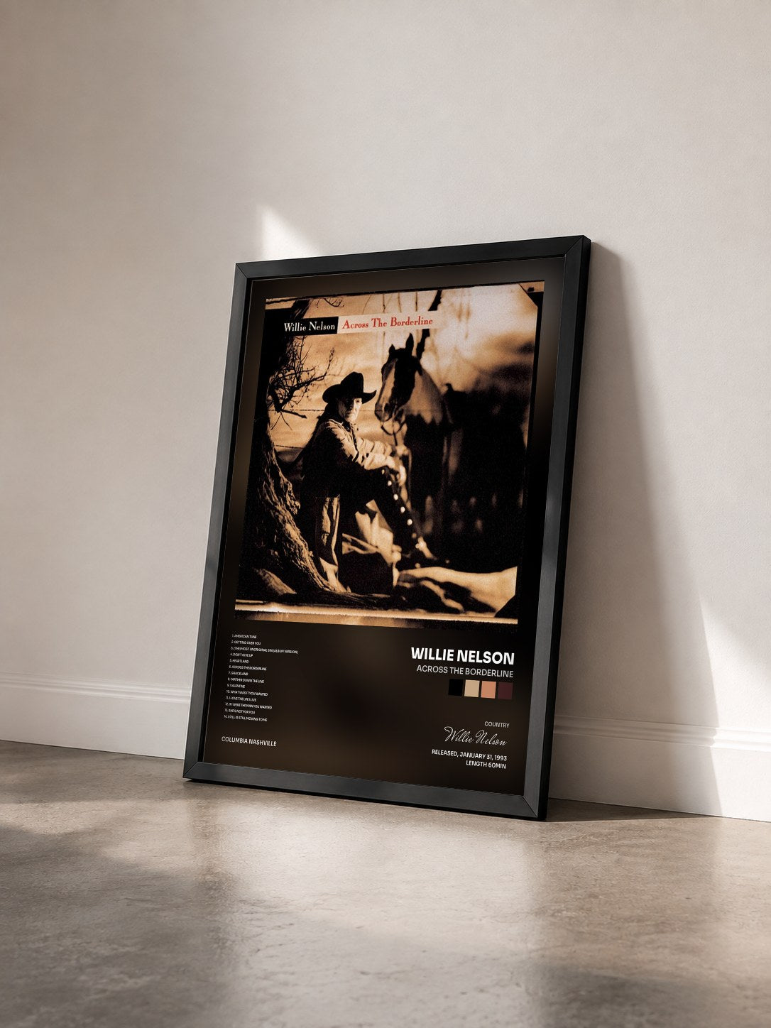 #noir Tableau de l'album Across The Borderline de Willie Nelson vu de trois quarts, cadre noir