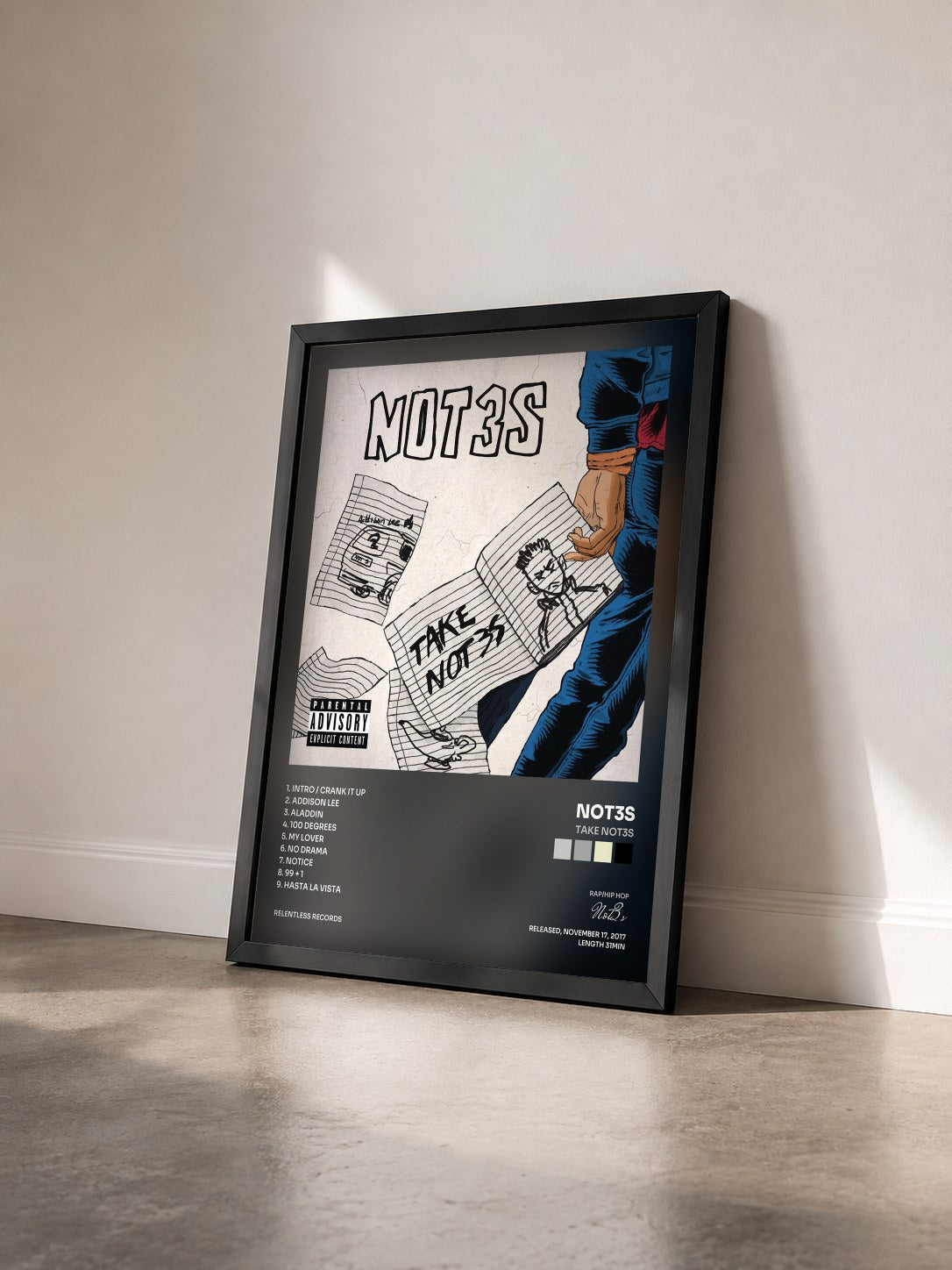 #noir Tableau de l'album Take Not3s de Not3s vu de trois quarts, cadre noir