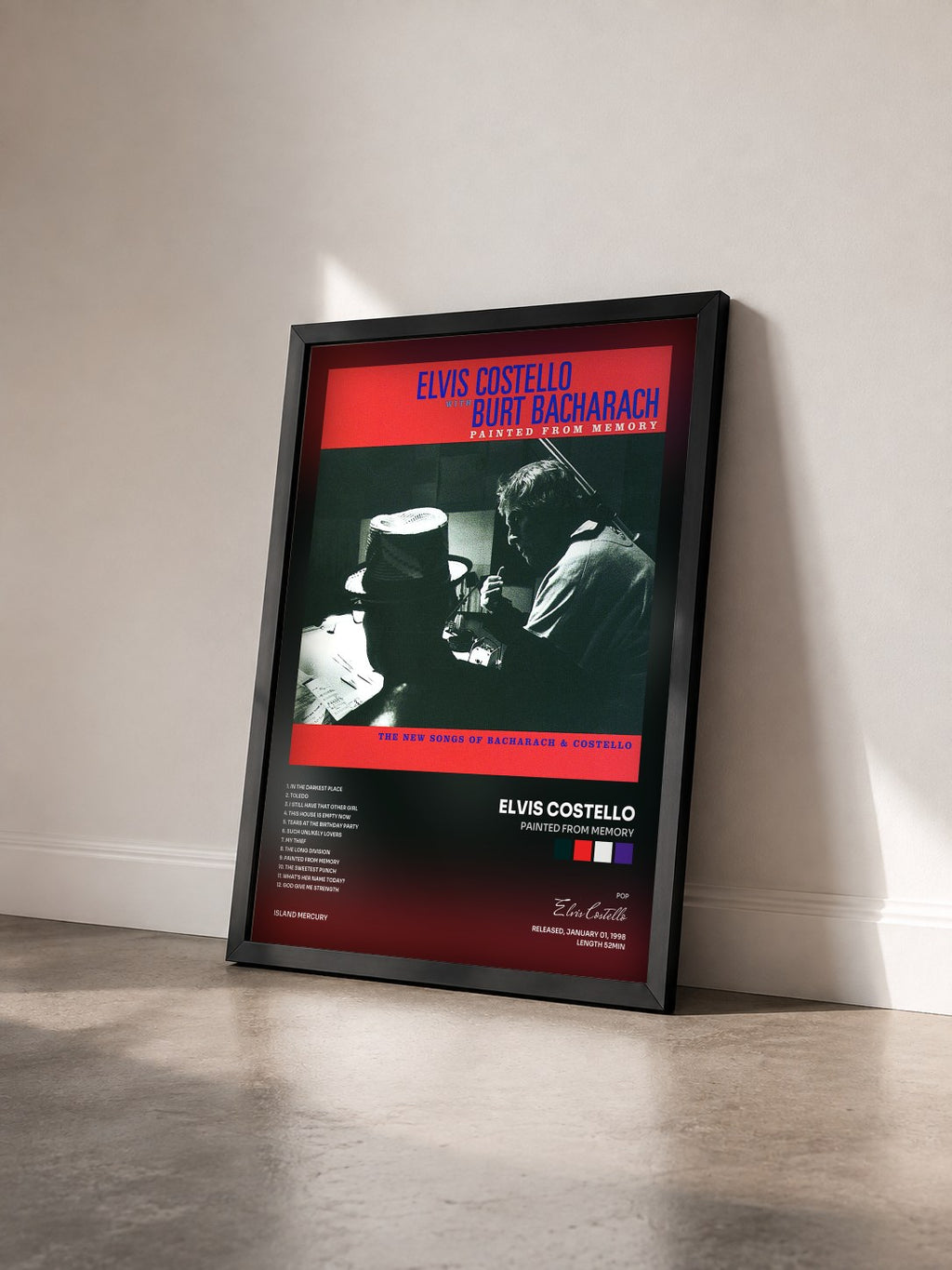 #noir Tableau de l'album Painted From Memory de Elvis Costello vu de trois quarts, cadre noir