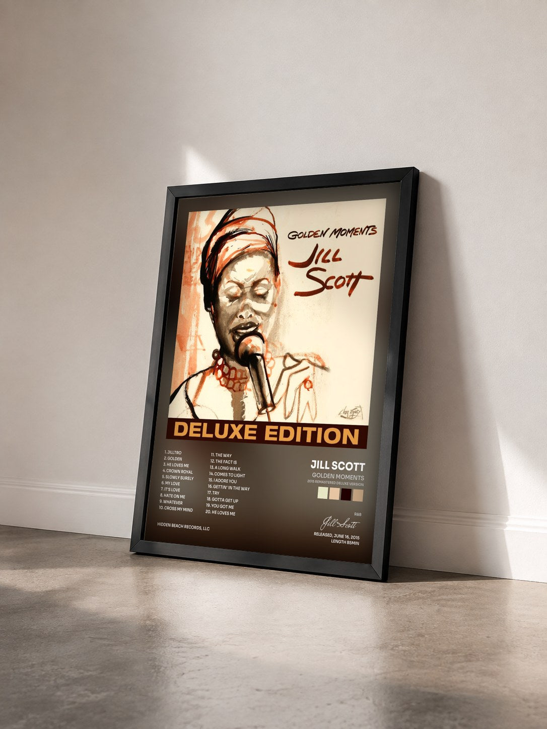 #noir Tableau de l'album Golden Moments (2015 Remastered Deluxe Version) de Jill Scott vu de trois quarts, cadre noir