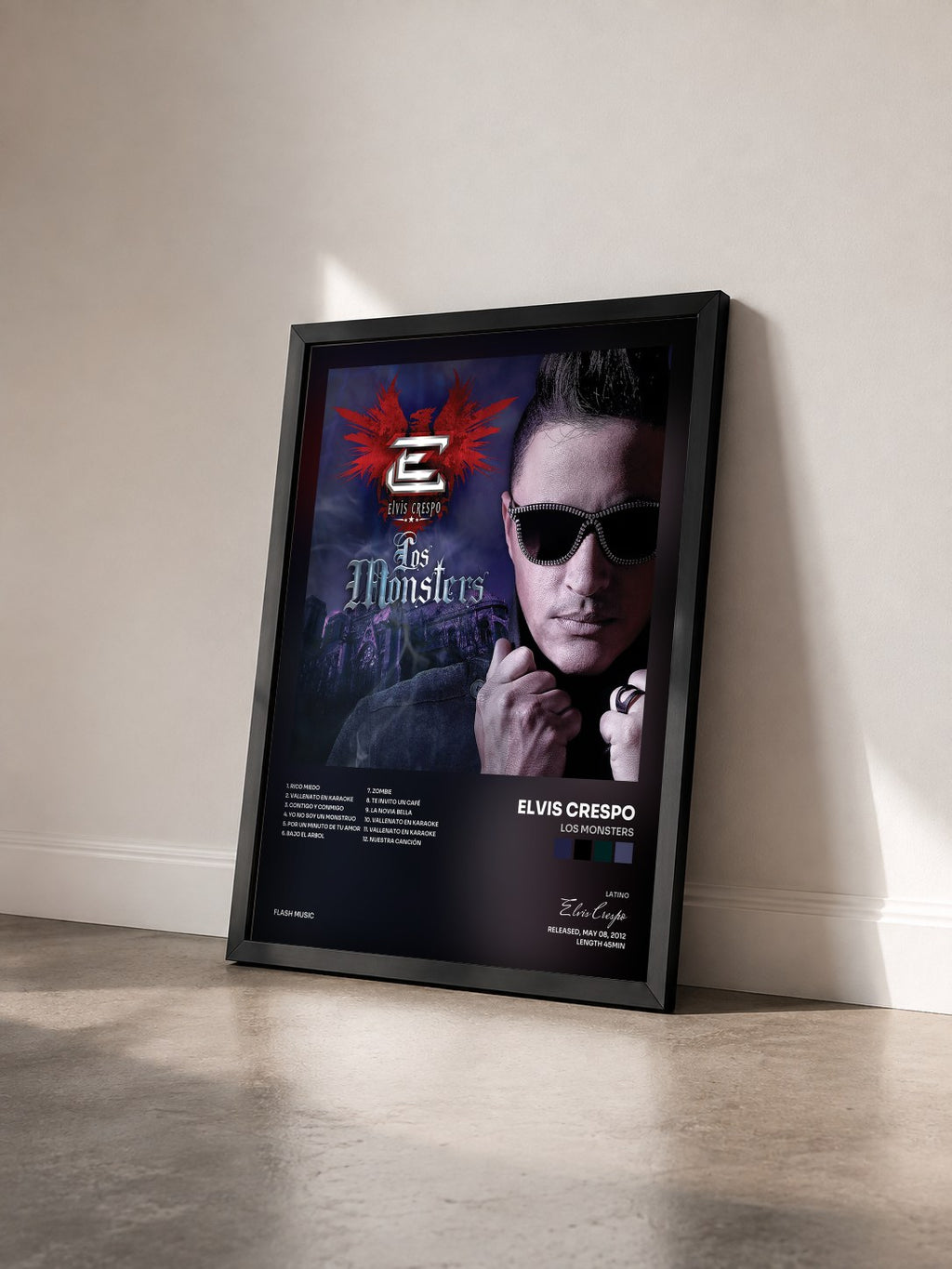 #noir Tableau de l'album Los Monsters de Elvis Crespo vu de trois quarts, cadre noir