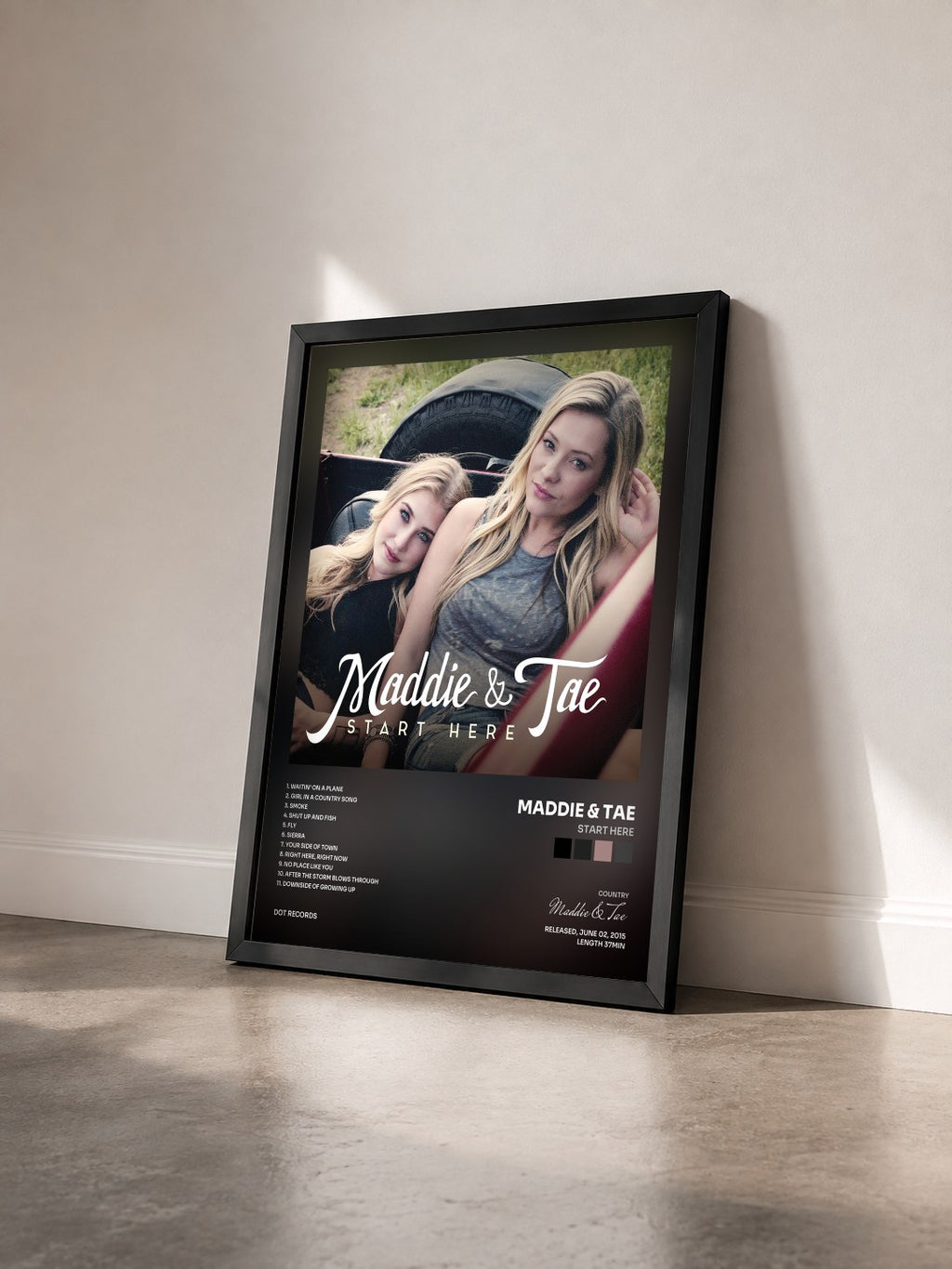 #noir Tableau de l'album Start Here de Maddie & Tae vu de trois quarts, cadre noir