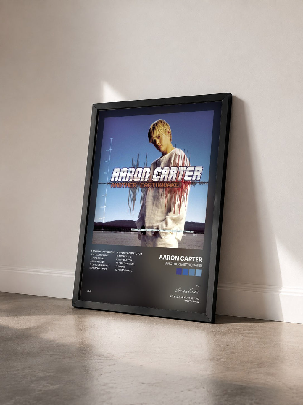 #noir Tableau de l'album Another Earthquake! de Aaron Carter vu de trois quarts, cadre noir
