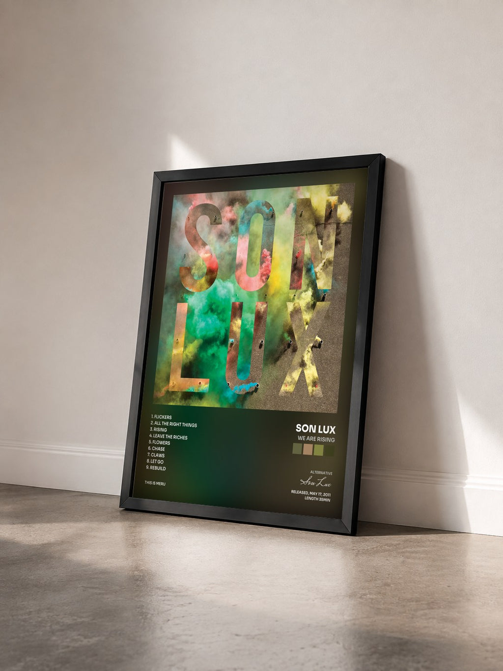 #noir Tableau de l'album We Are Rising de Son Lux vu de trois quarts, cadre noir