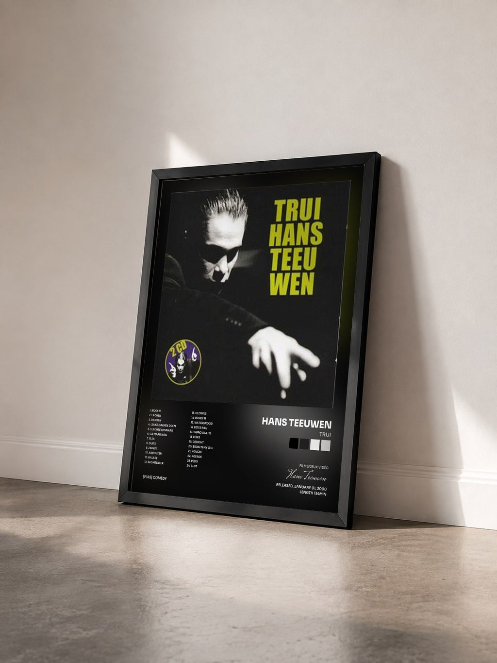 #noir Tableau de l'album Trui de Hans Teeuwen vu de trois quarts, cadre noir