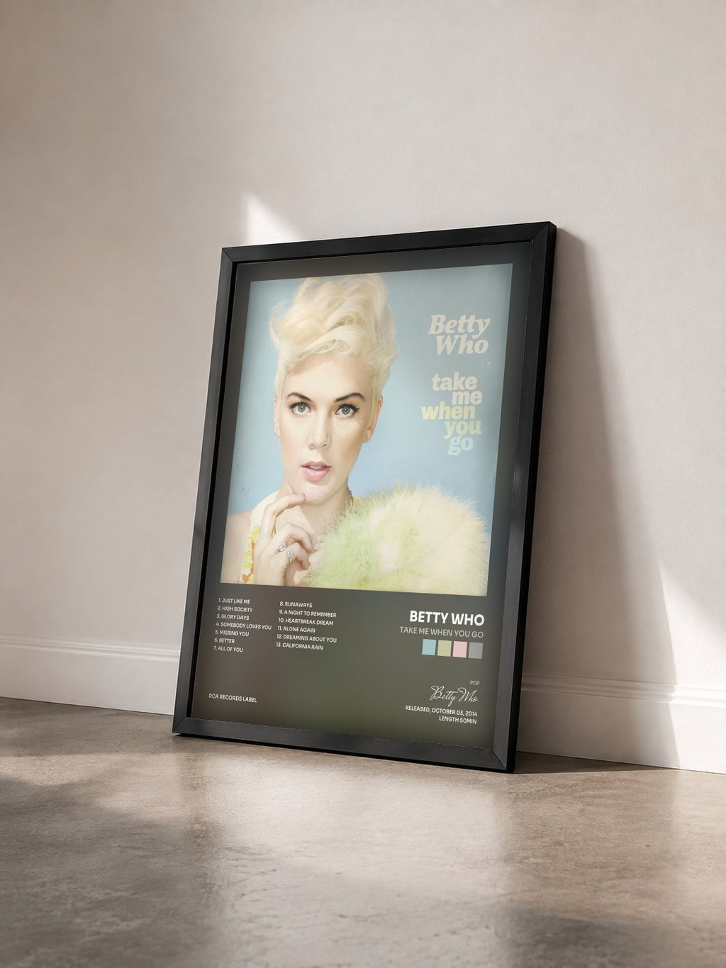 #noir Tableau de l'album Take Me When You Go de Betty Who vu de trois quarts, cadre noir