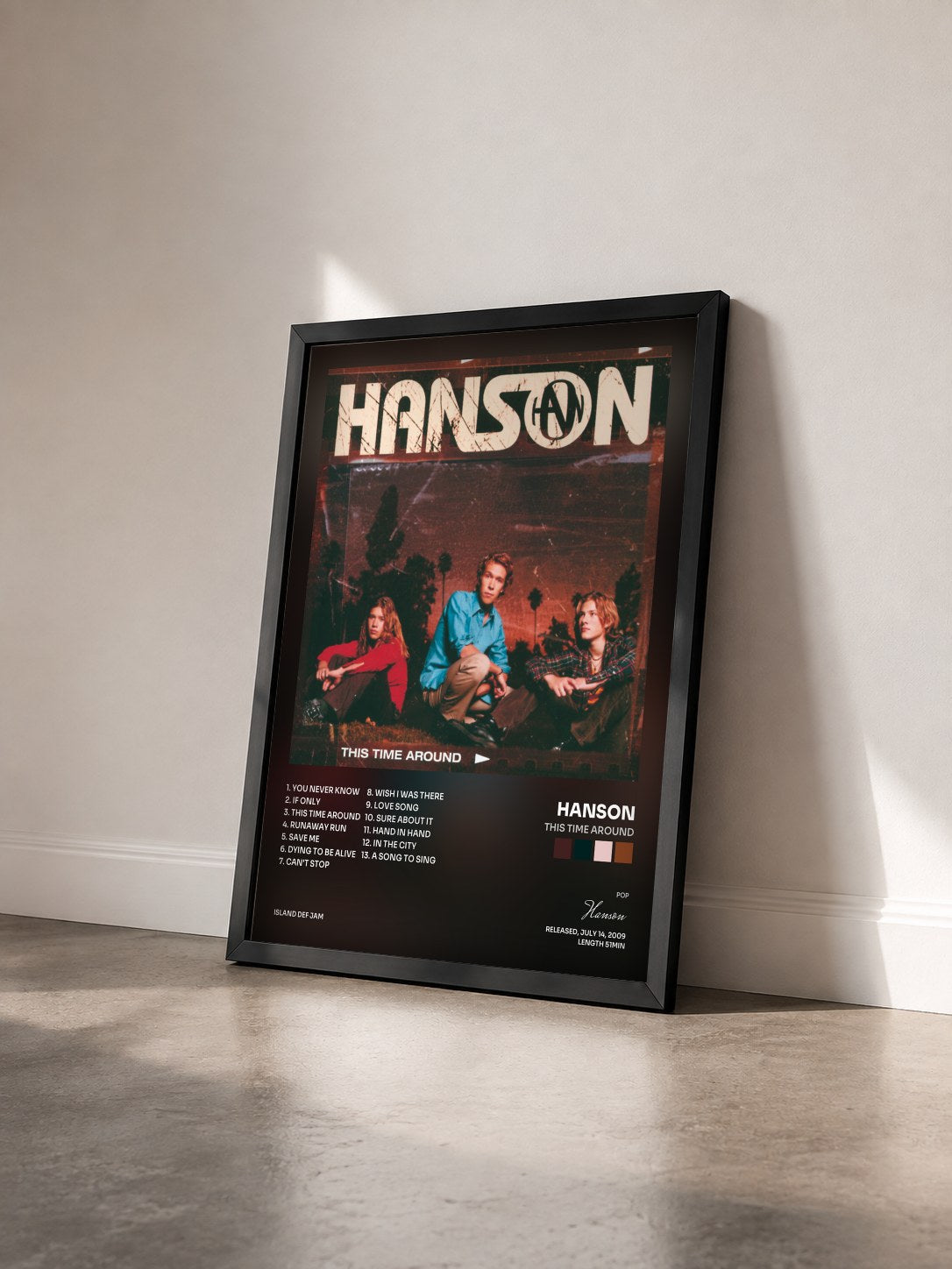 #noir Tableau de l'album This Time Around de Hanson vu de trois quarts, cadre noir
