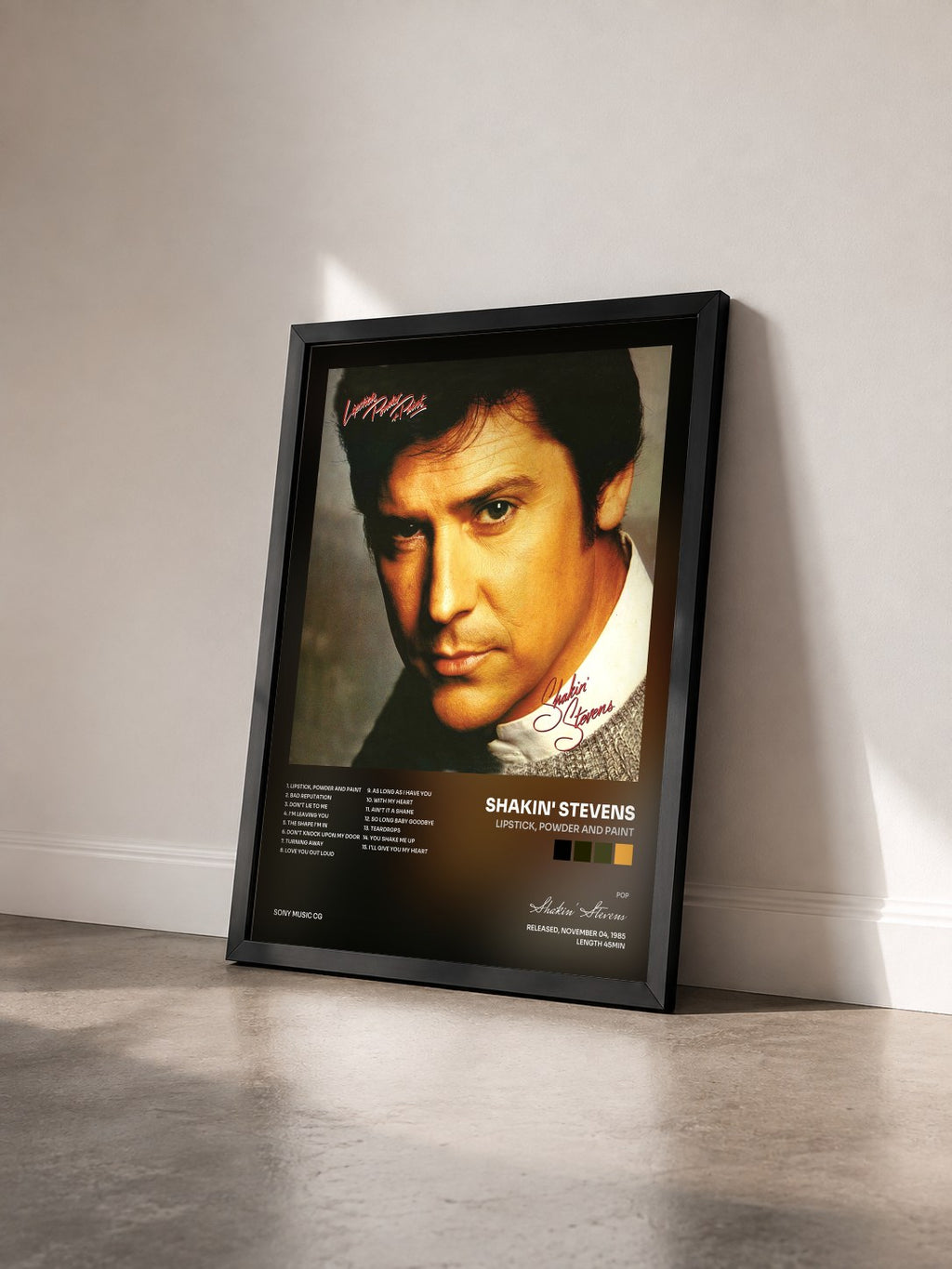 #noir Tableau de l'album Lipstick, Powder and Paint de Shakin' Stevens vu de trois quarts, cadre noir