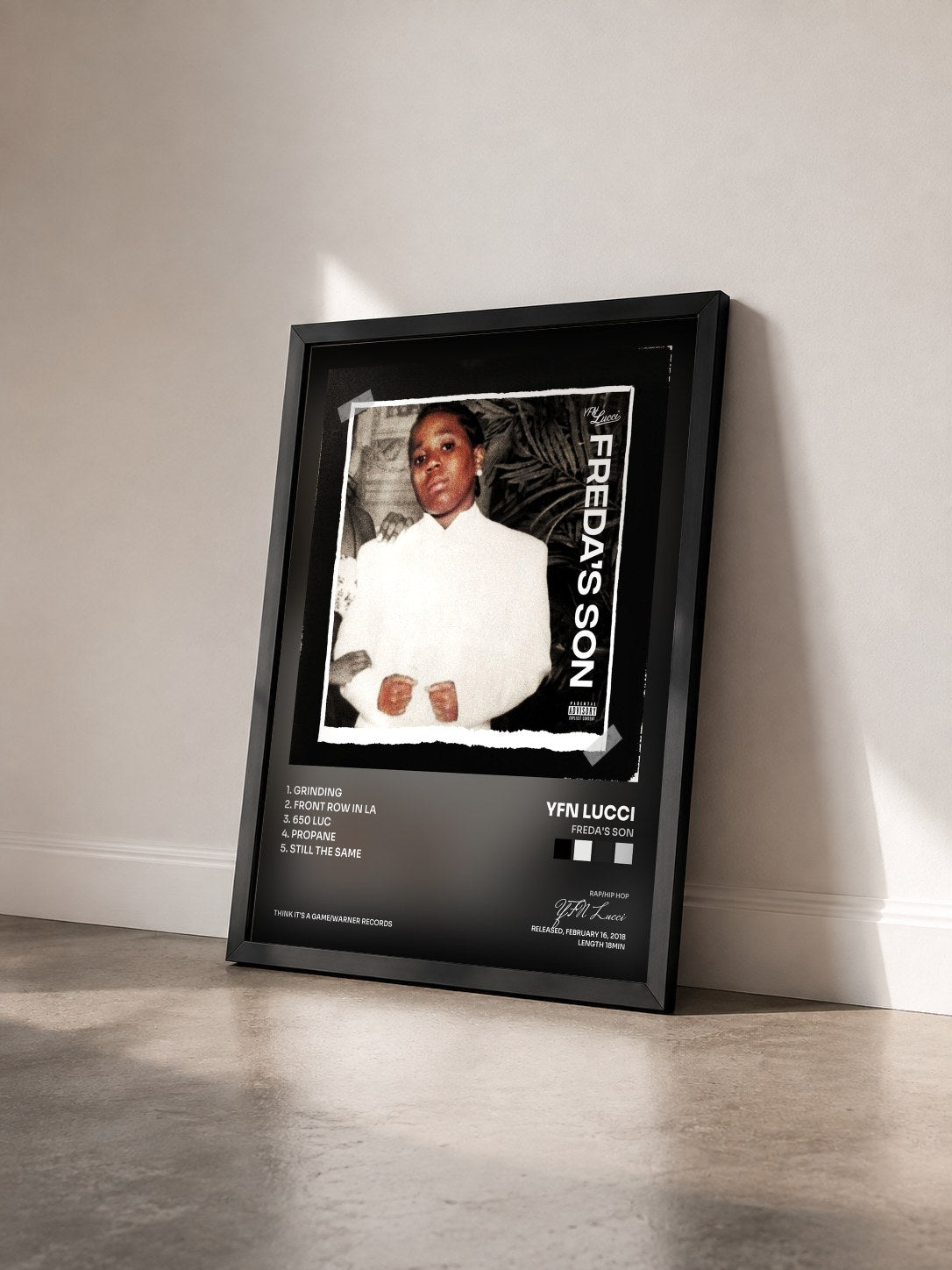 #noir Tableau de l'album Freda's Son de YFN Lucci vu de trois quarts, cadre noir
