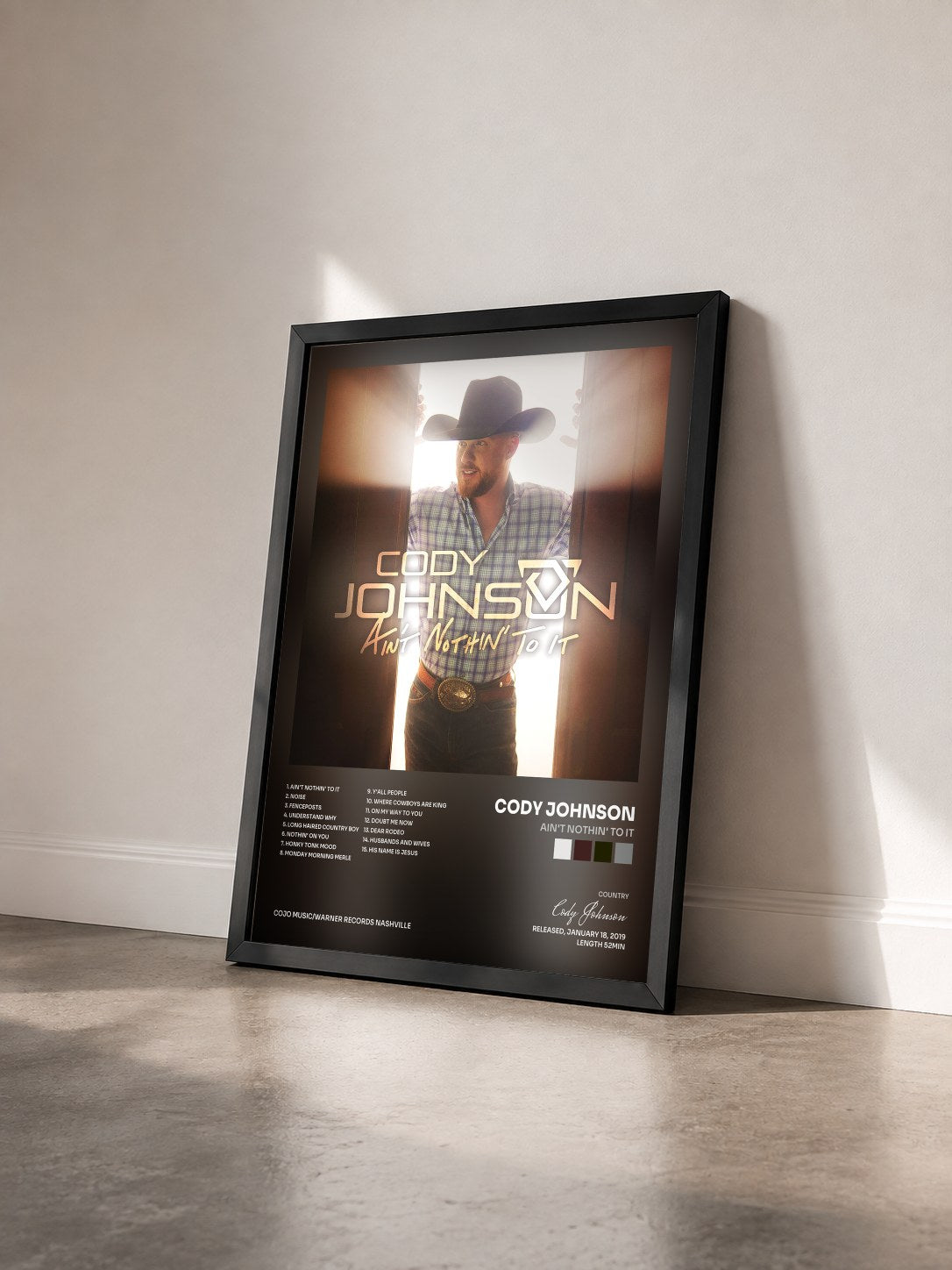 #noir Tableau de l'album Ain't Nothin' to It de Cody Johnson vu de trois quarts, cadre noir