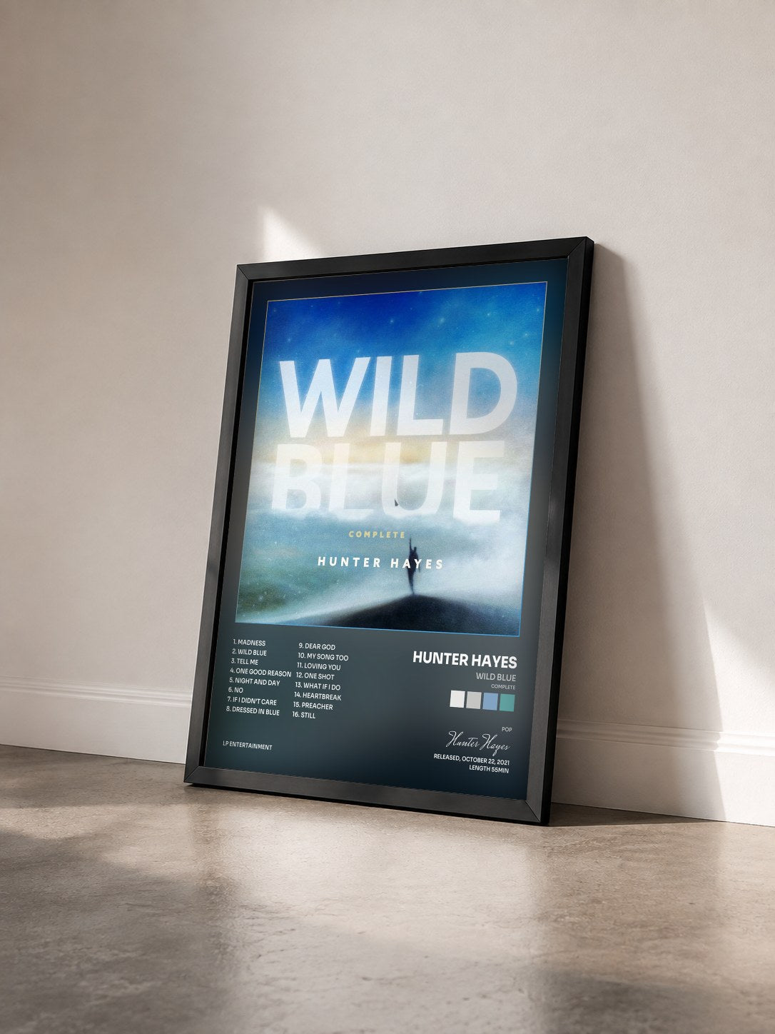 #noir Tableau de l'album Wild Blue (Complete) de Hunter Hayes vu de trois quarts, cadre noir