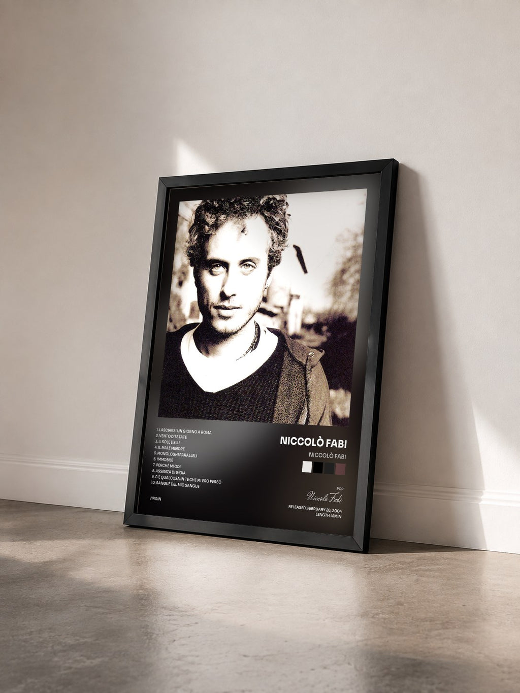 #noir Tableau de l'album Niccolò Fabi de Niccolò Fabi vu de trois quarts, cadre noir
