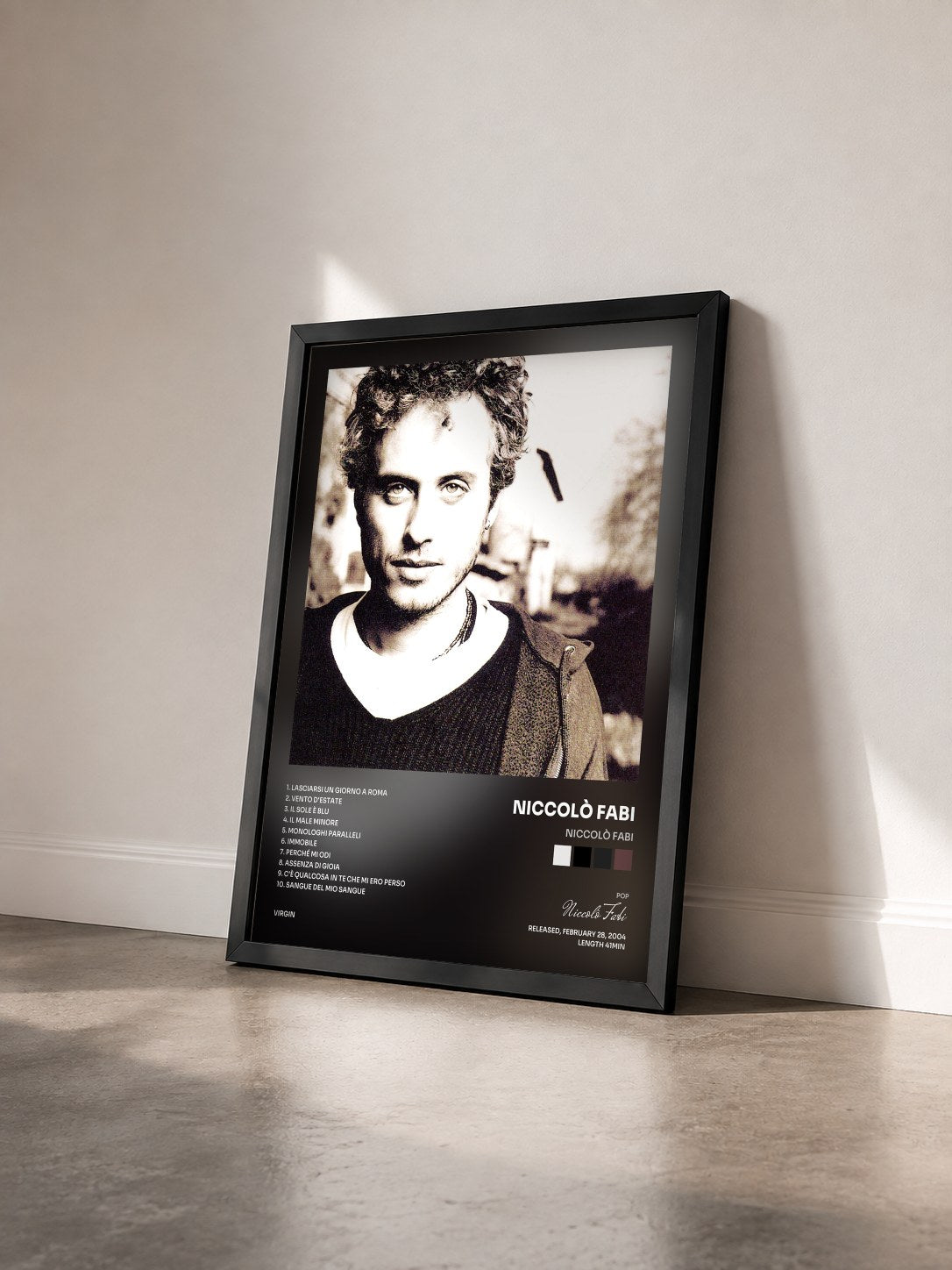 #noir Tableau de l'album Niccolò Fabi de Niccolò Fabi vu de trois quarts, cadre noir