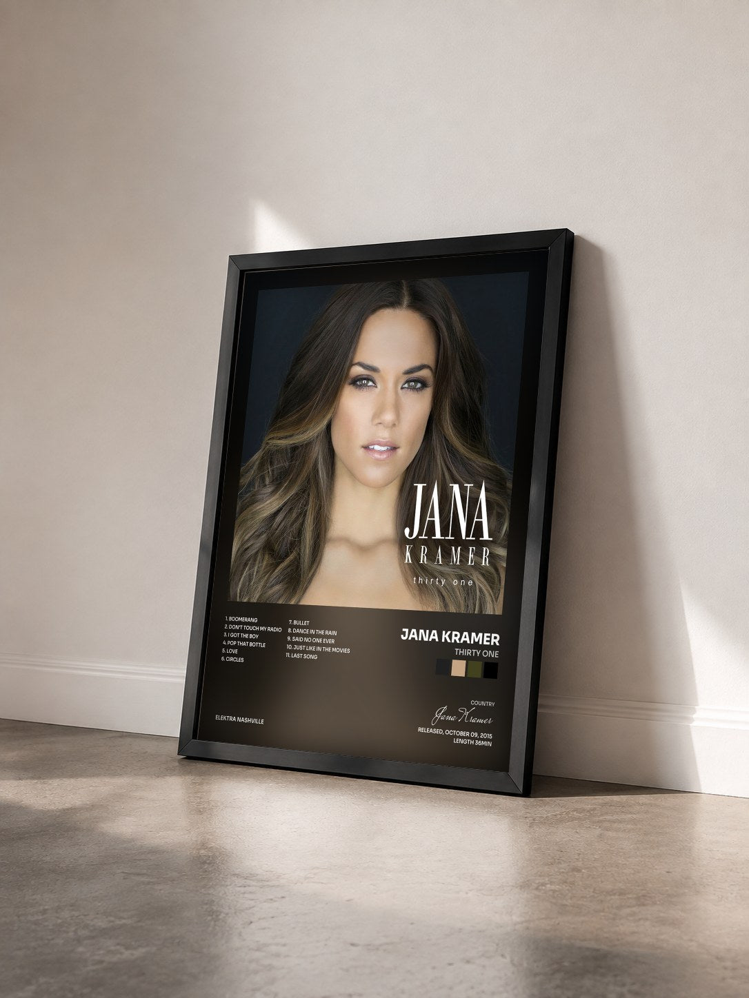 #noir Tableau de l'album thirty one de Jana Kramer vu de trois quarts, cadre noir