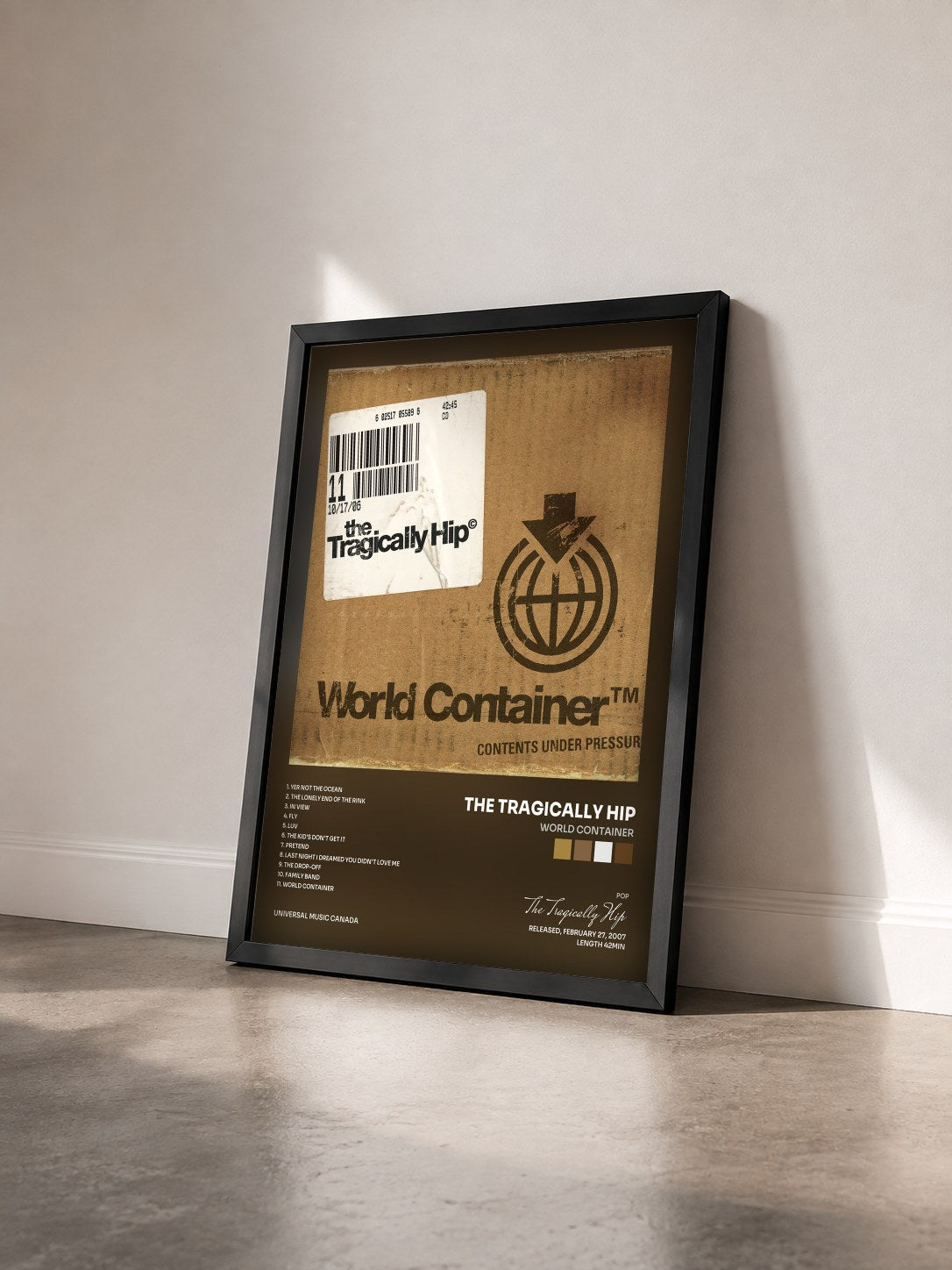 #noir Tableau de l'album World Container de The Tragically Hip vu de trois quarts, cadre noir