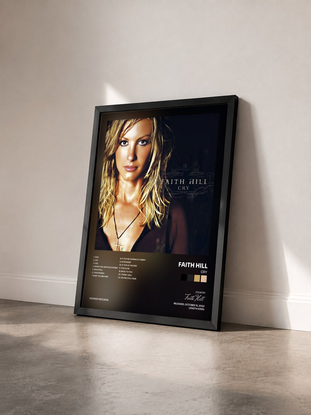 #noir Tableau de l'album Cry de Faith Hill vu de trois quarts, cadre noir