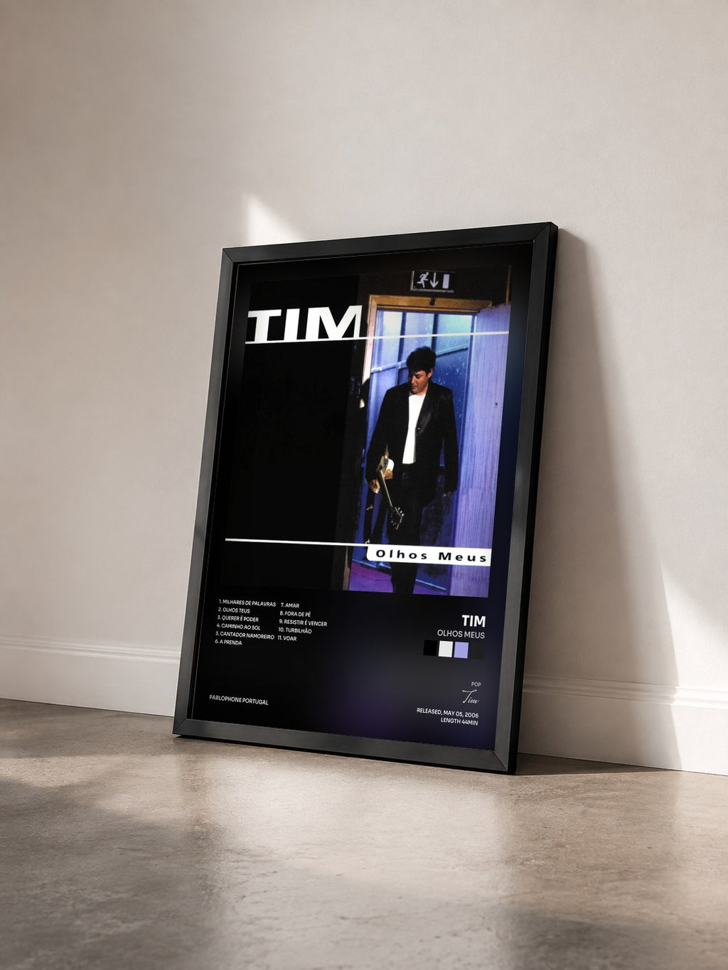 #noir Tableau de l'album Olhos Meus de Tim vu de trois quarts, cadre noir