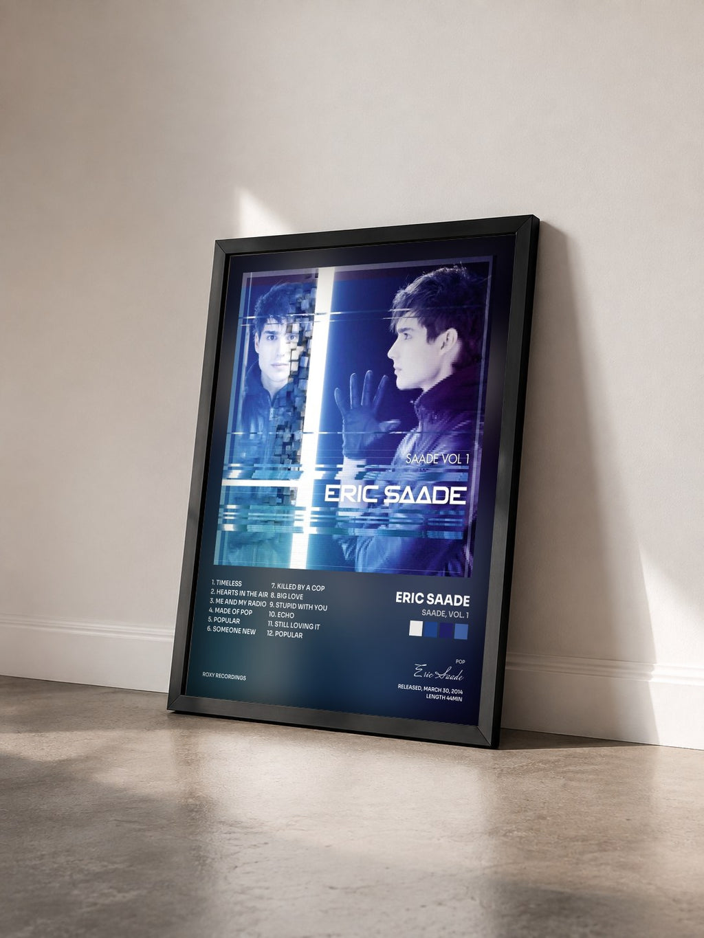 #noir Tableau de l'album Saade, Vol. 1 de Eric Saade vu de trois quarts, cadre noir