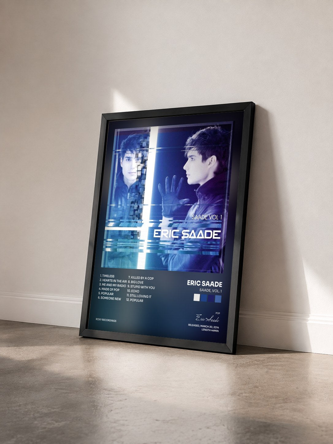 #noir Tableau de l'album Saade, Vol. 1 de Eric Saade vu de trois quarts, cadre noir