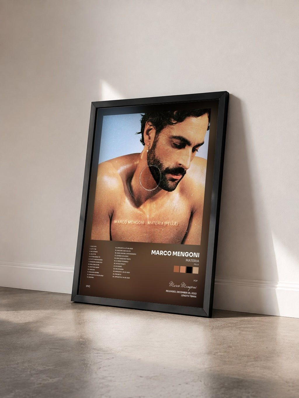#noir Tableau de l'album MATERIA (PELLE) de Marco Mengoni vu de trois quarts, cadre noir