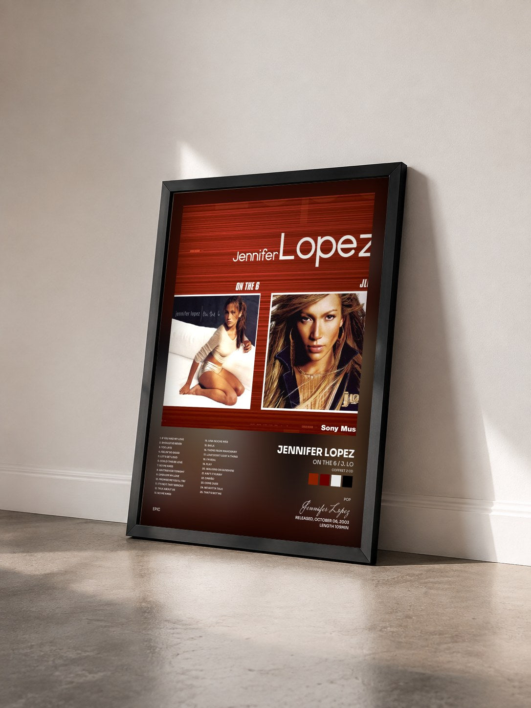 #noir Tableau de l'album On The 6 / J. Lo (Coffret 2 CD) de Jennifer Lopez vu de trois quarts, cadre noir