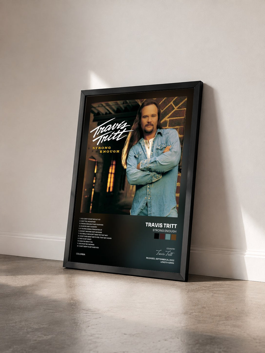 #noir Tableau de l'album Strong Enough de Travis Tritt vu de trois quarts, cadre noir