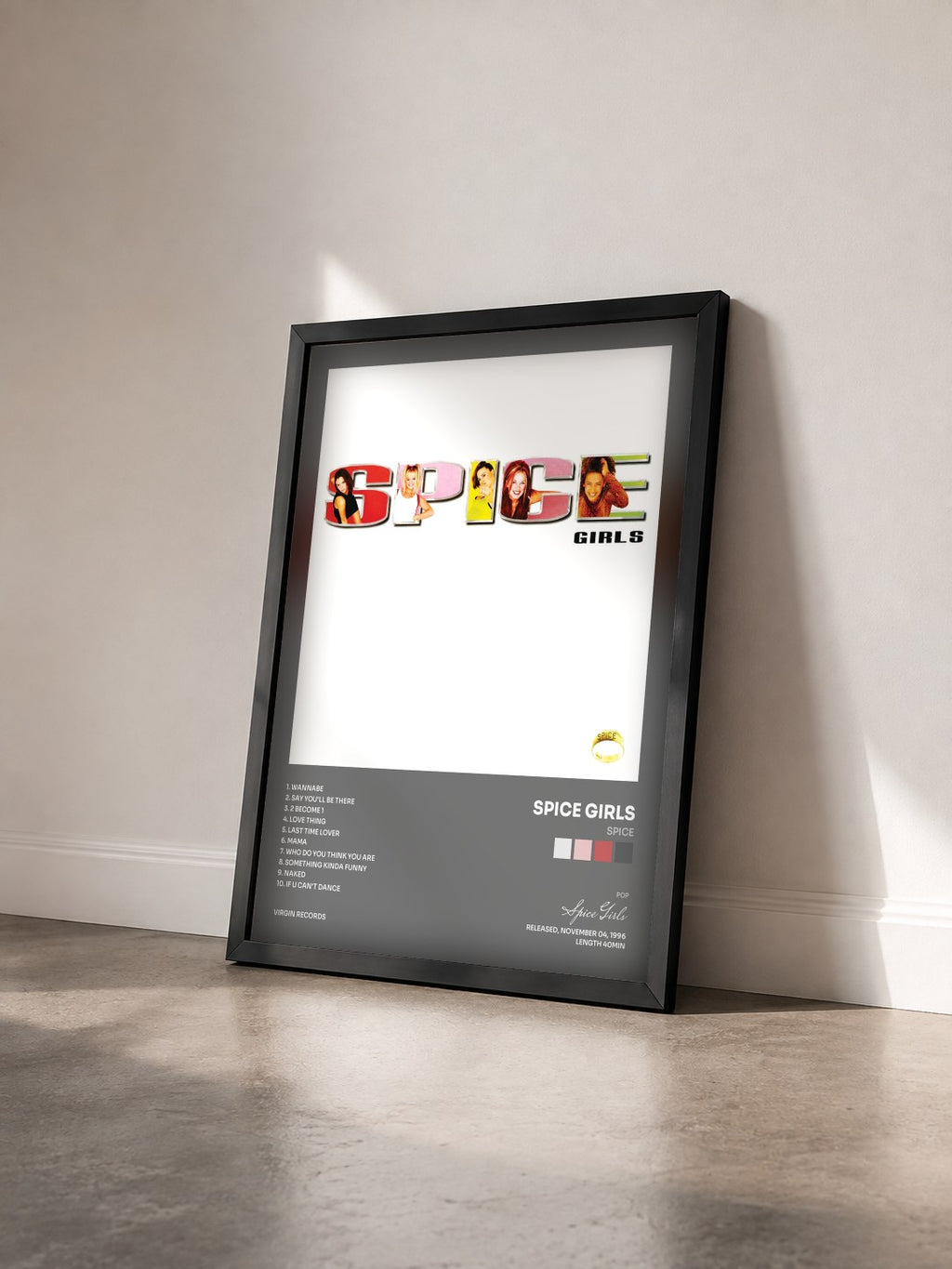 #noir Tableau de l'album Spice de Spice Girls vu de trois quarts, cadre noir