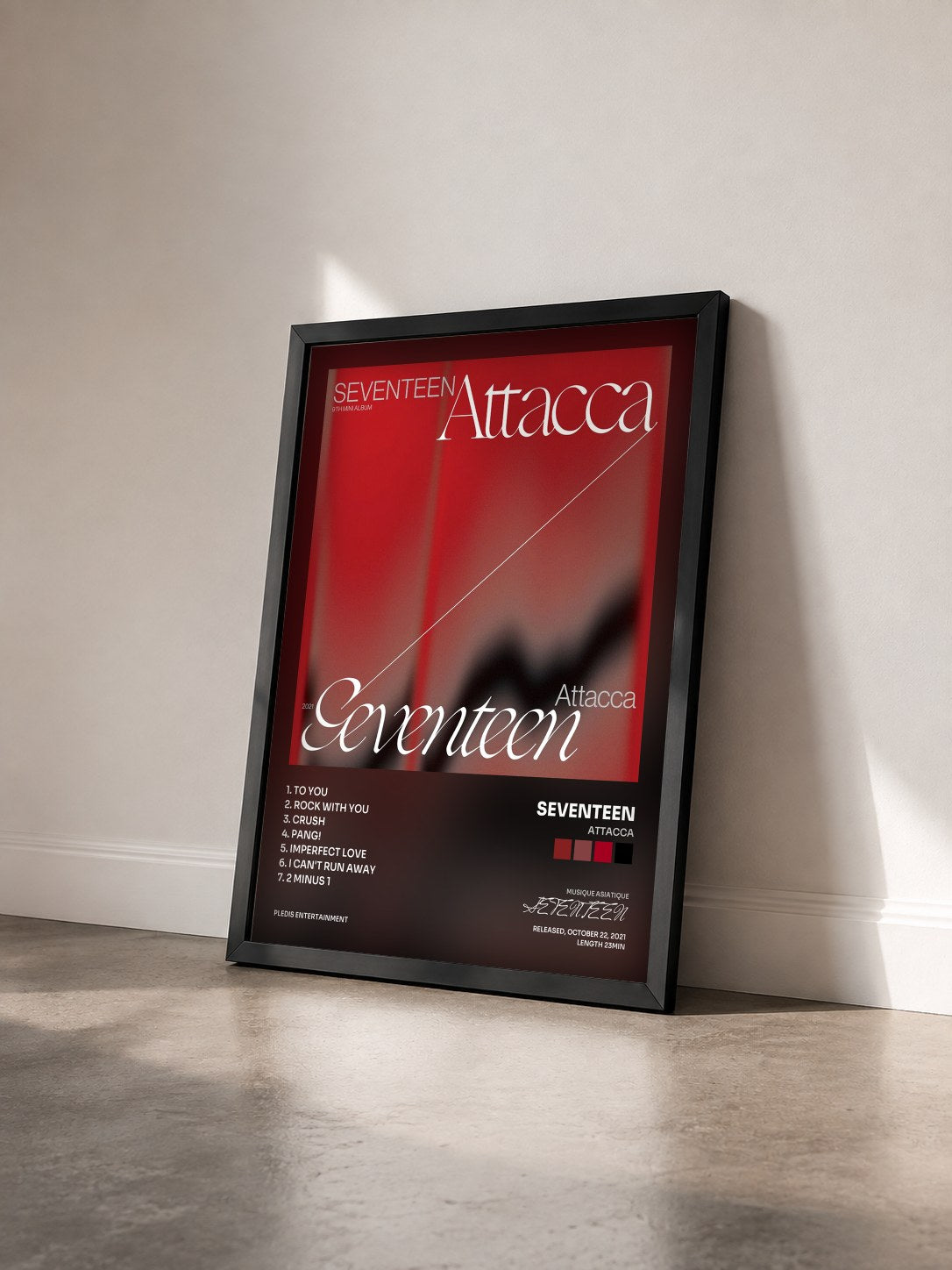 #noir Tableau de l'album Attacca de SEVENTEEN vu de trois quarts, cadre noir