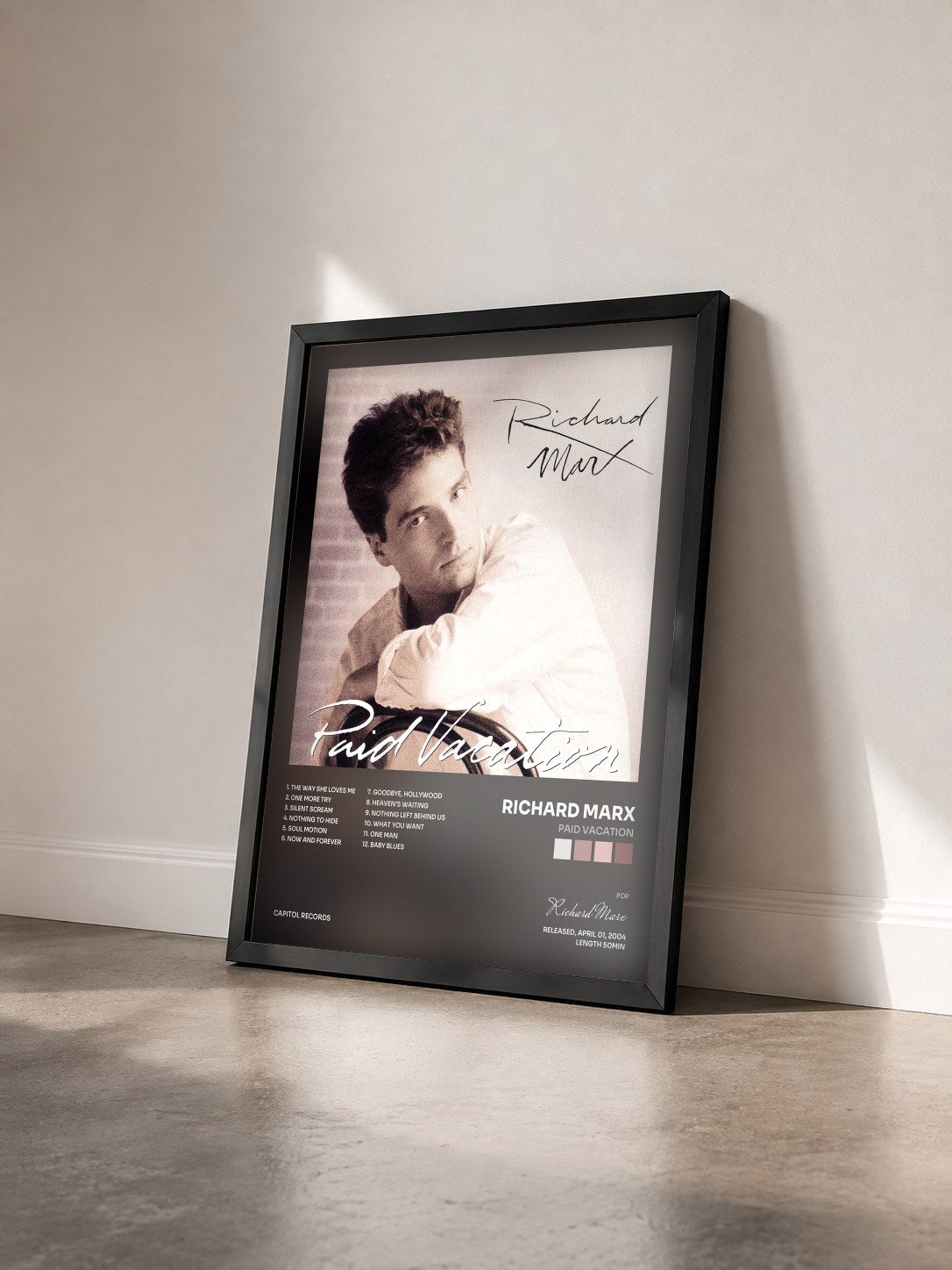 #noir Tableau de l'album Paid Vacation de Richard Marx vu de trois quarts, cadre noir