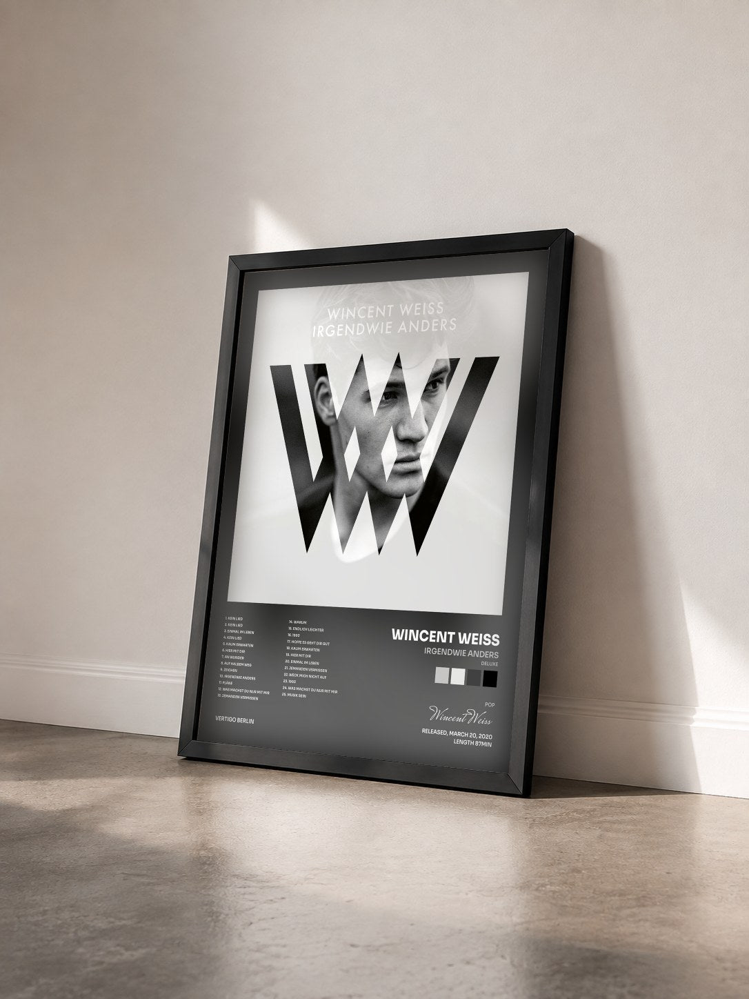 #noir Tableau de l'album Irgendwie anders (Deluxe) de Wincent Weiss vu de trois quarts, cadre noir