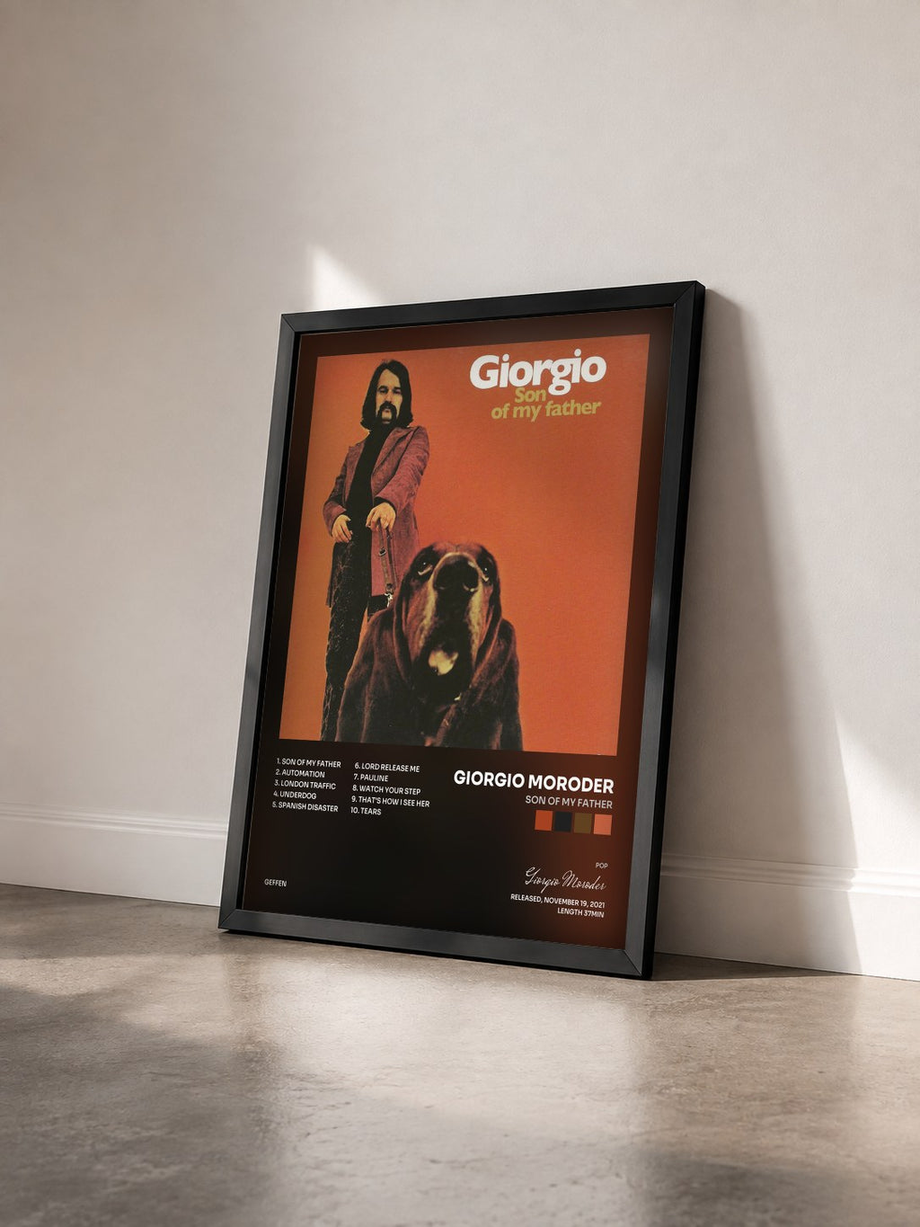 #noir Tableau de l'album Son Of My Father de Giorgio Moroder vu de trois quarts, cadre noir