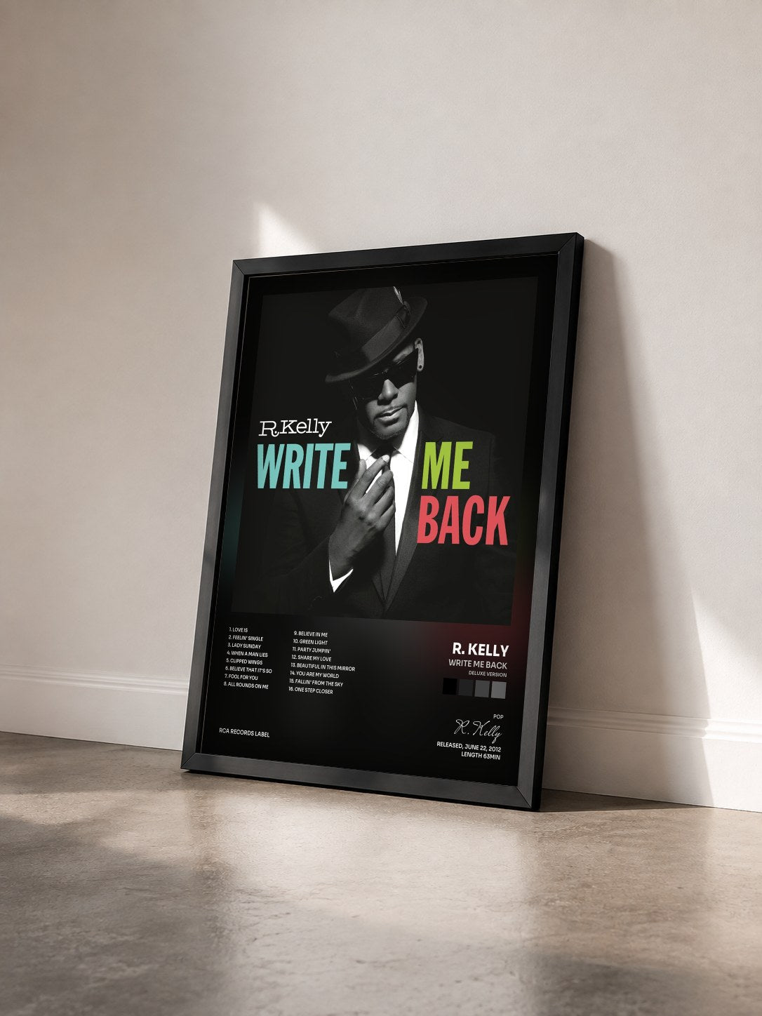 #noir Tableau de l'album Write Me Back (Deluxe Version) de R. Kelly vu de trois quarts, cadre noir