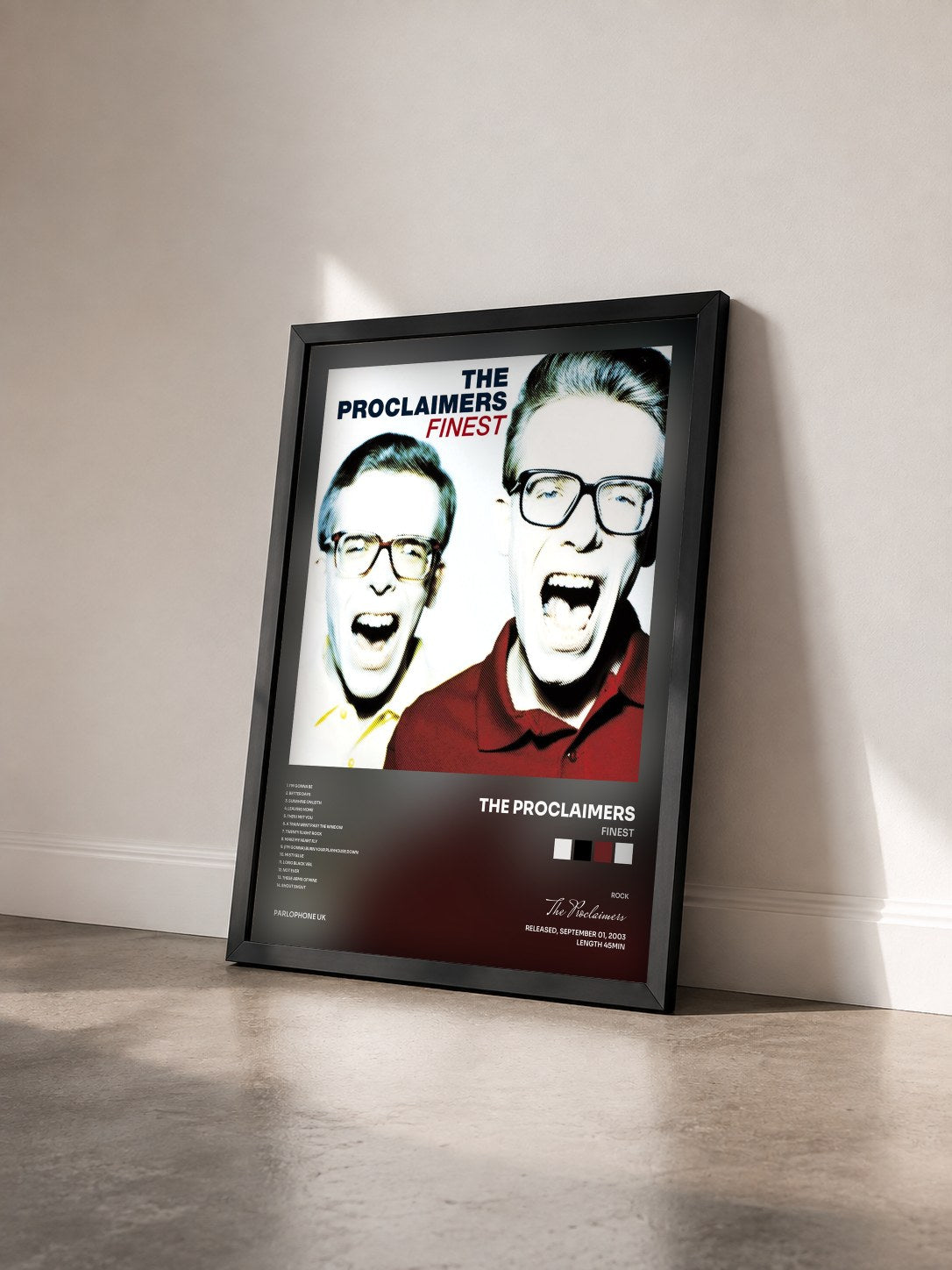 #noir Tableau de l'album Finest de The Proclaimers vu de trois quarts, cadre noir