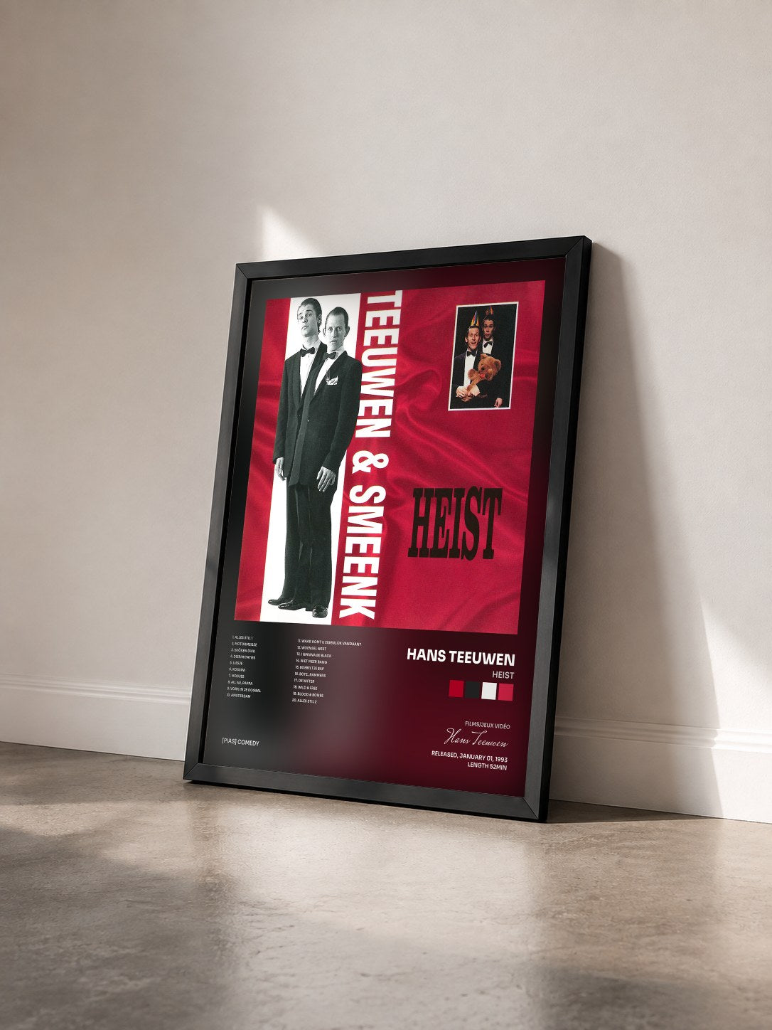 #noir Tableau de l'album Heist de Hans Teeuwen vu de trois quarts, cadre noir