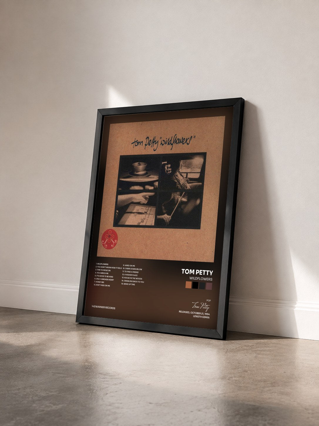 #noir Tableau de l'album Wildflowers de Tom Petty vu de trois quarts, cadre noir