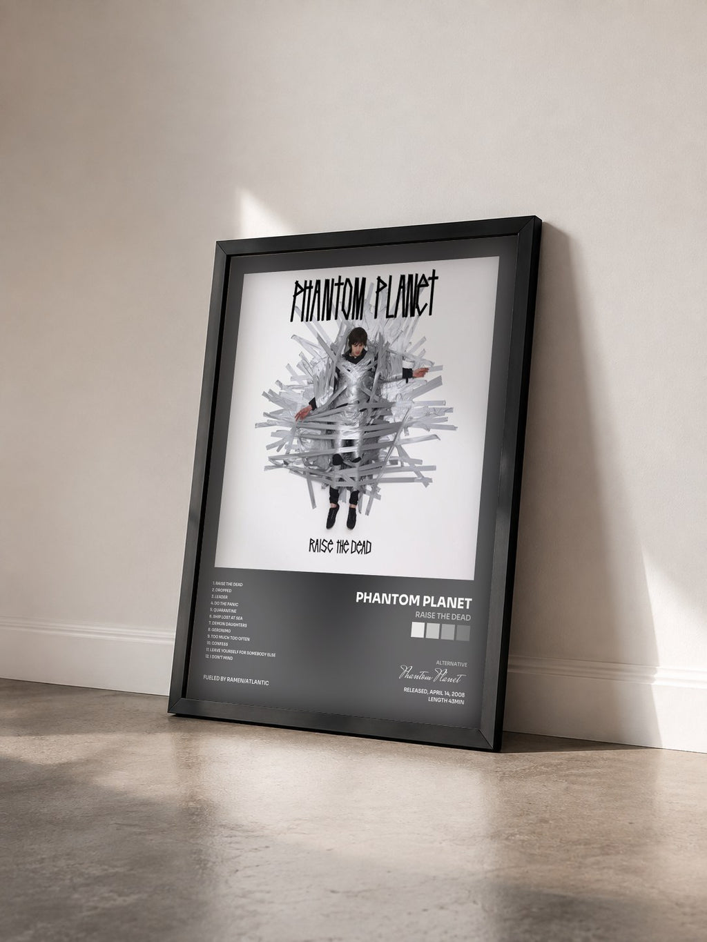 #noir Tableau de l'album Raise The Dead de Phantom Planet vu de trois quarts, cadre noir