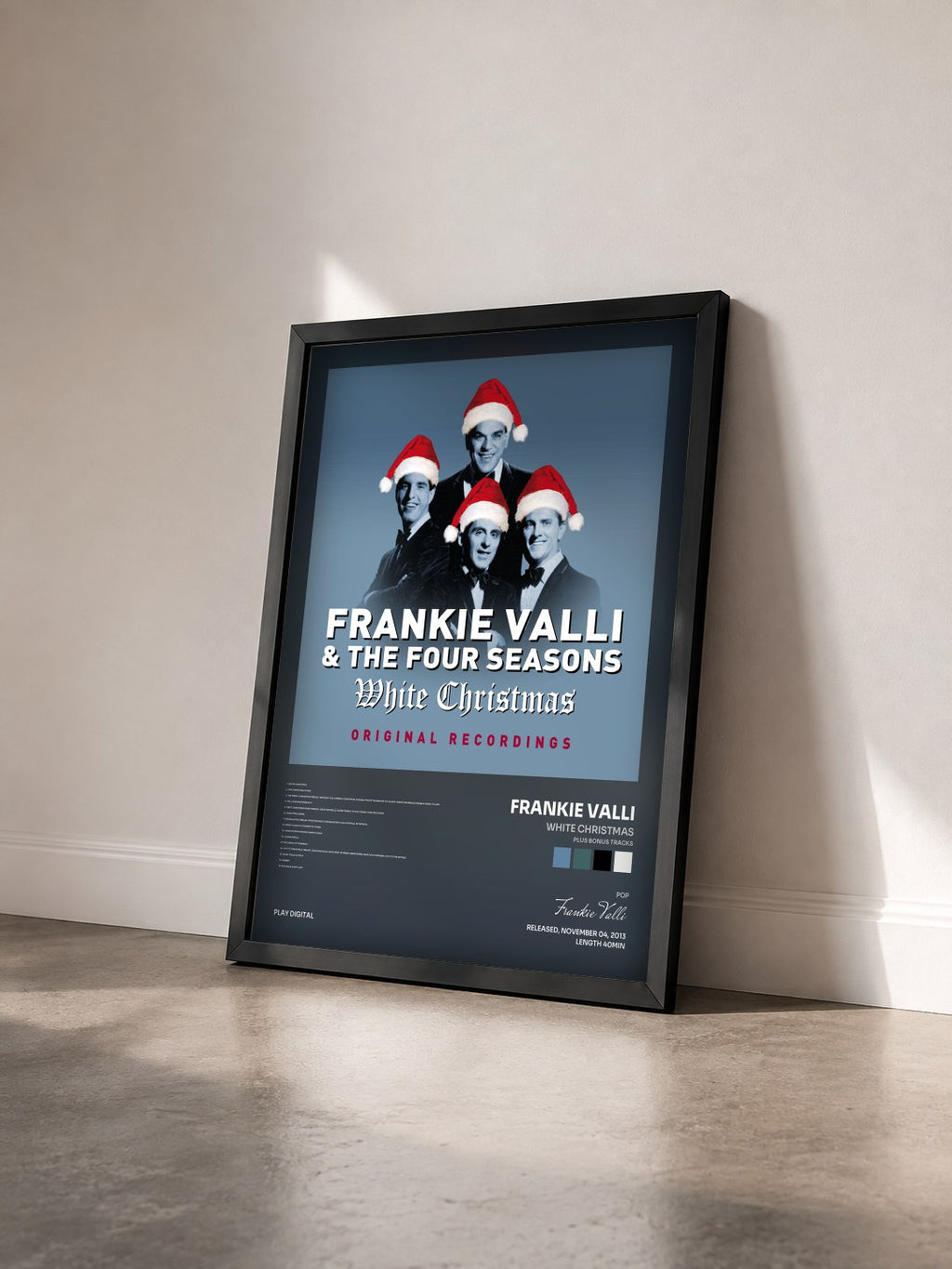 #noir Tableau de l'album White Christmas (Plus Bonus Tracks) de Frankie Valli vu de trois quarts, cadre noir