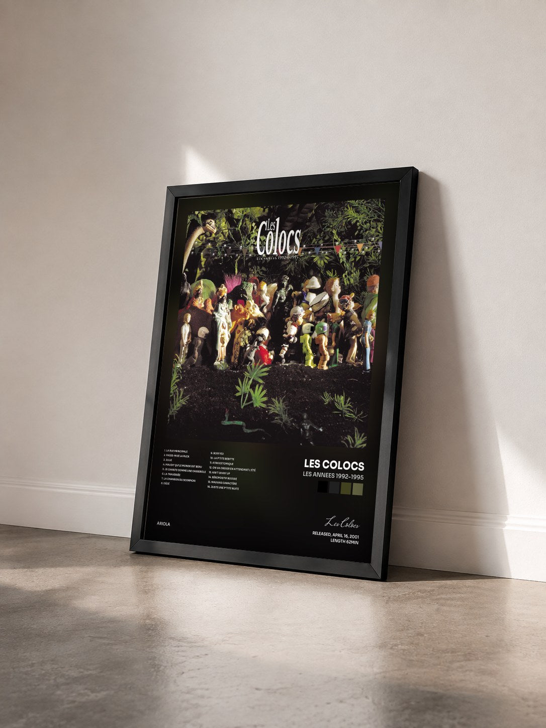 #noir Tableau de l'album Les Annees 1992-1995 de Les Colocs vu de trois quarts, cadre noir
