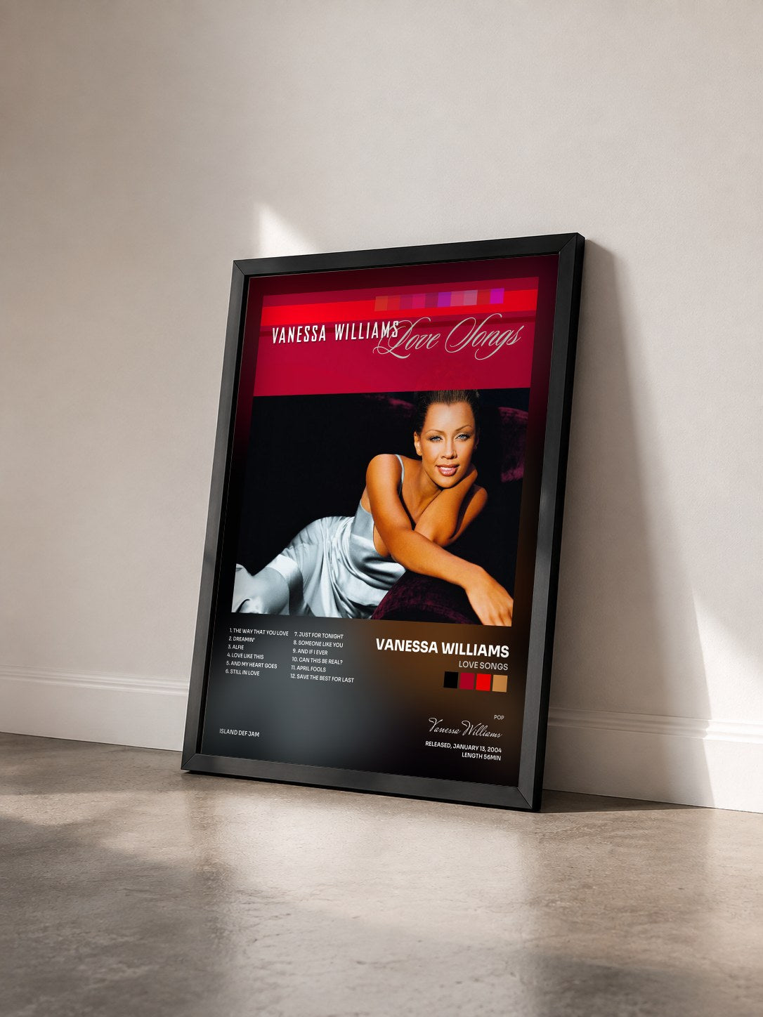 #noir Tableau de l'album Love Songs de Vanessa Williams vu de trois quarts, cadre noir