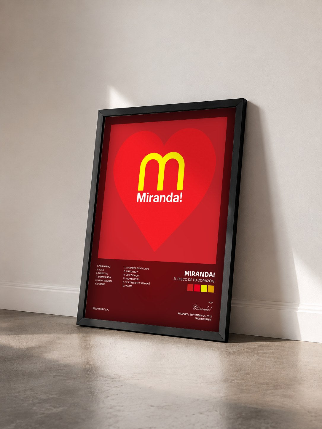 #noir Tableau de l'album El Disco de Tu Corazón de Miranda! vu de trois quarts, cadre noir