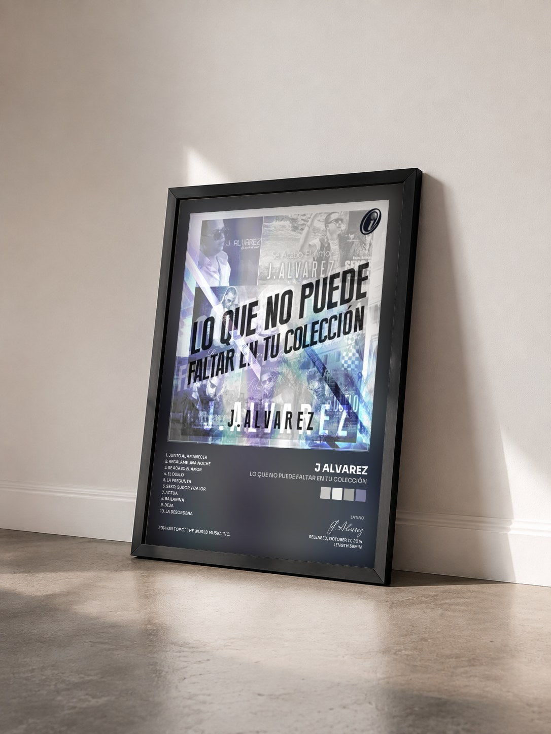 #noir Tableau de l'album Lo Que No Puede Faltar en Tu Colección de J Alvarez vu de trois quarts, cadre noir