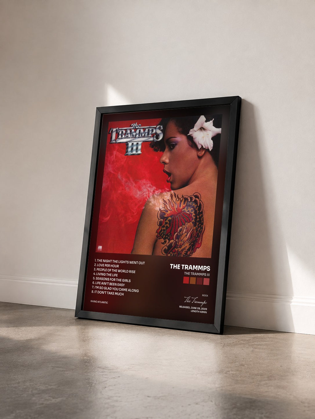 #noir Tableau de l'album The Trammps III de The Trammps vu de trois quarts, cadre noir