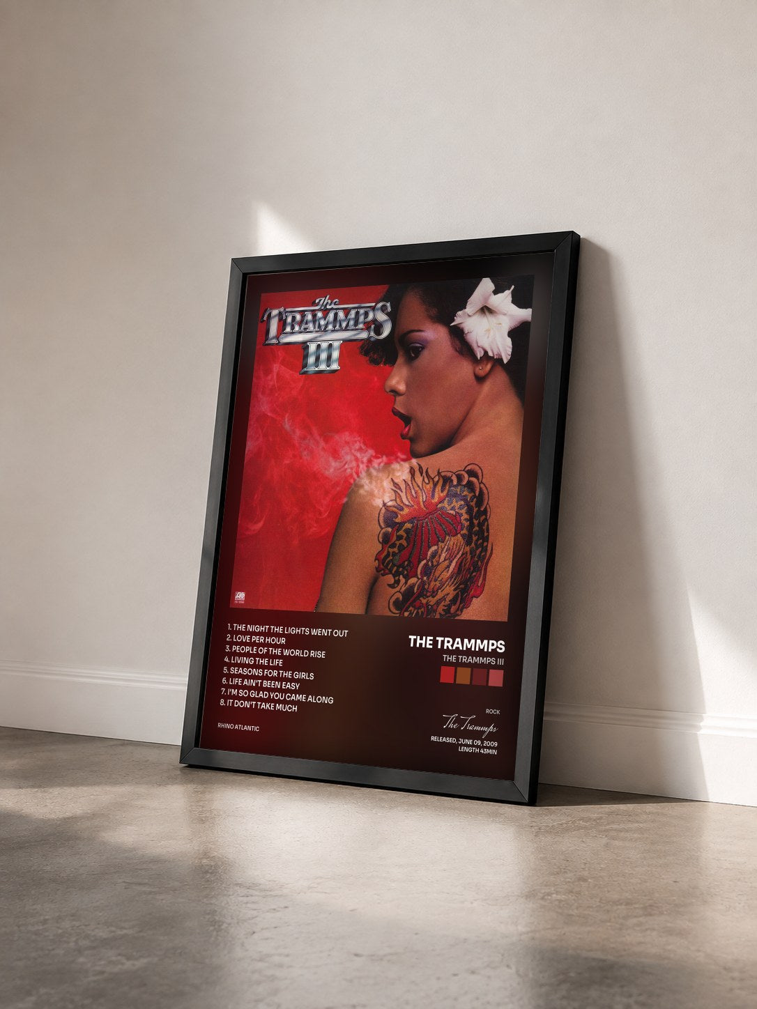 #noir Tableau de l'album The Trammps III de The Trammps vu de trois quarts, cadre noir