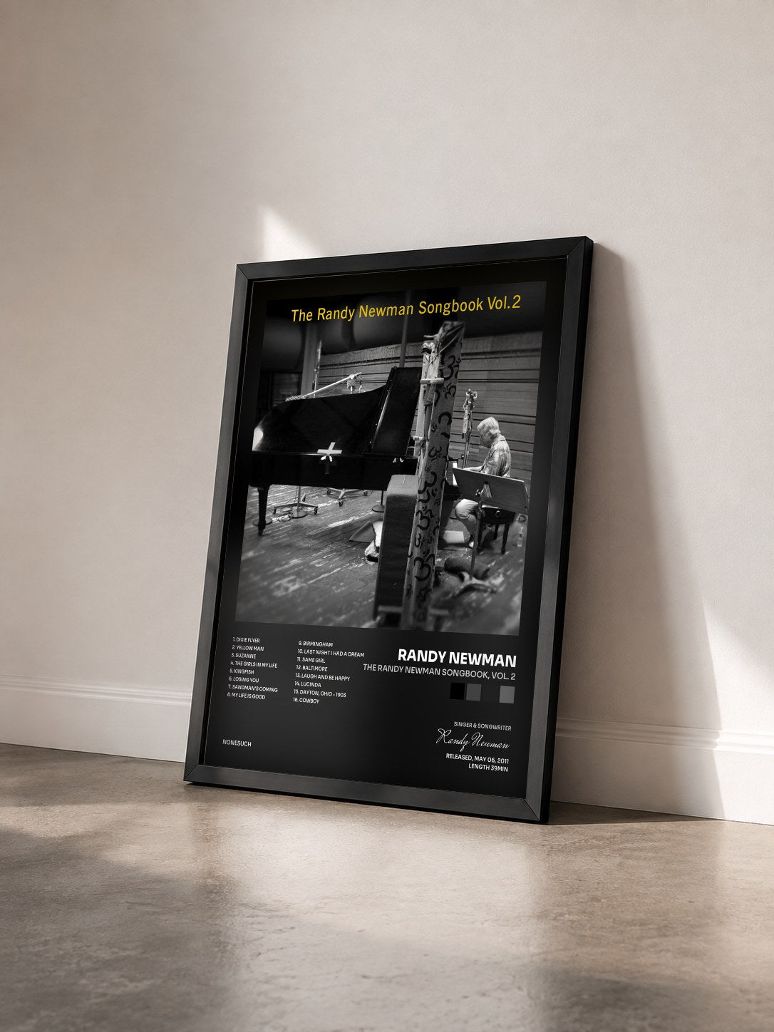 #noir Tableau de l'album The Randy Newman Songbook, Vol. 2 de Randy Newman vu de trois quarts, cadre noir