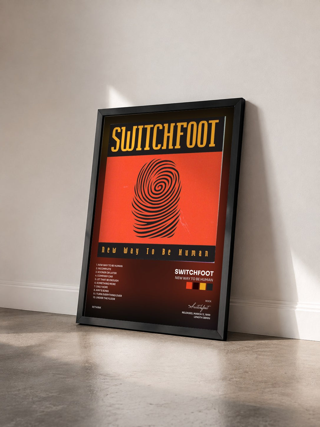 #noir Tableau de l'album New Way To Be Human de Switchfoot vu de trois quarts, cadre noir