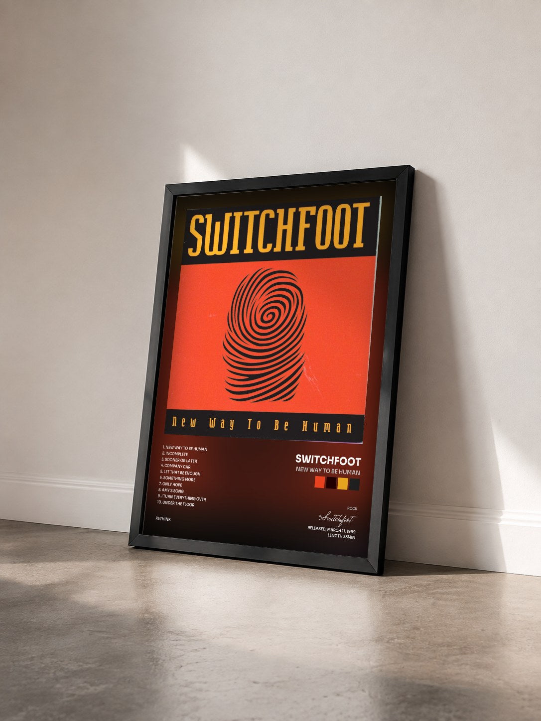 #noir Tableau de l'album New Way To Be Human de Switchfoot vu de trois quarts, cadre noir