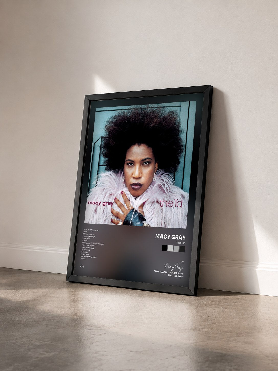 #noir Tableau de l'album the id de Macy Gray vu de trois quarts, cadre noir